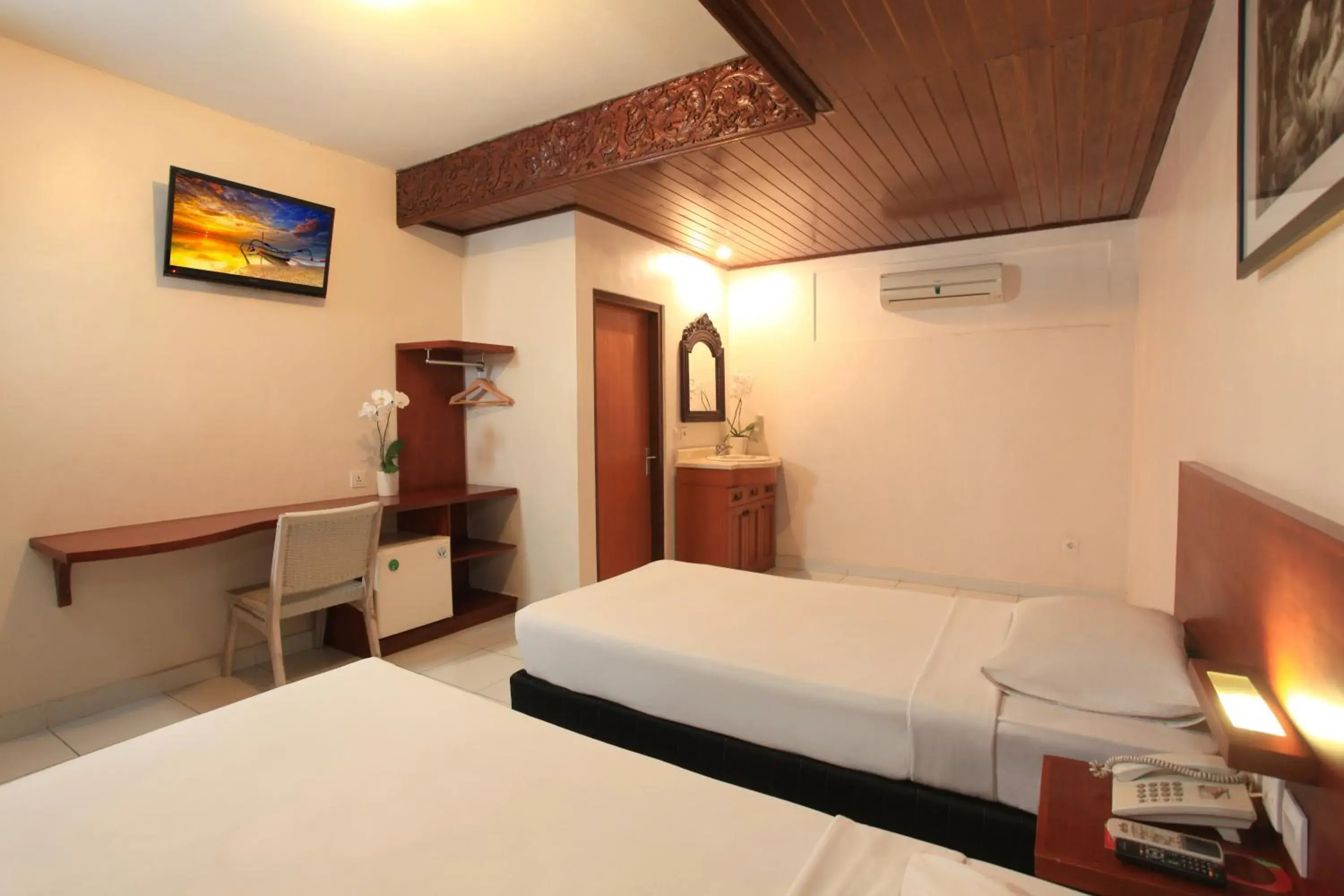 Bedroom in Matahari Bungalow Hotel