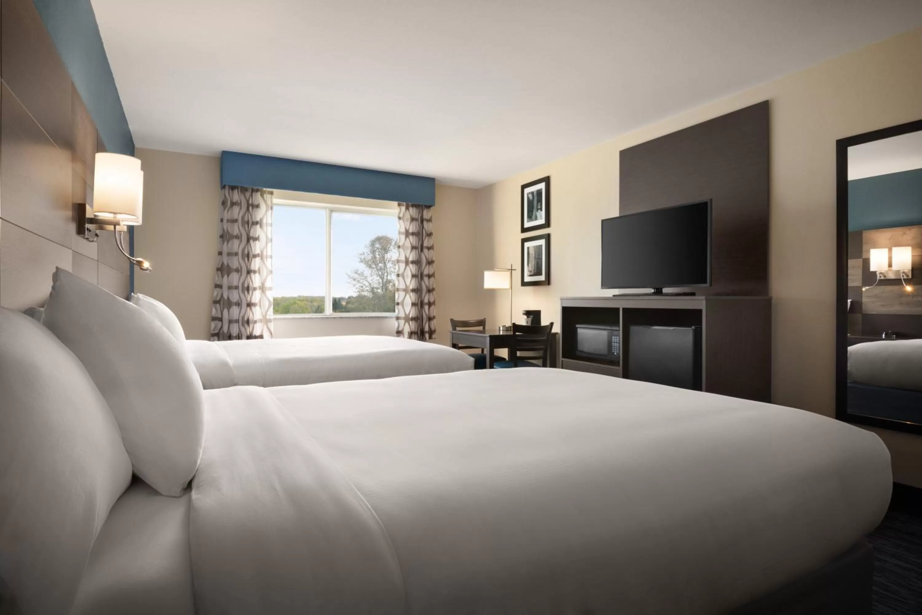 Guests, Bed in AmericInn by Wyndham Dodgeville