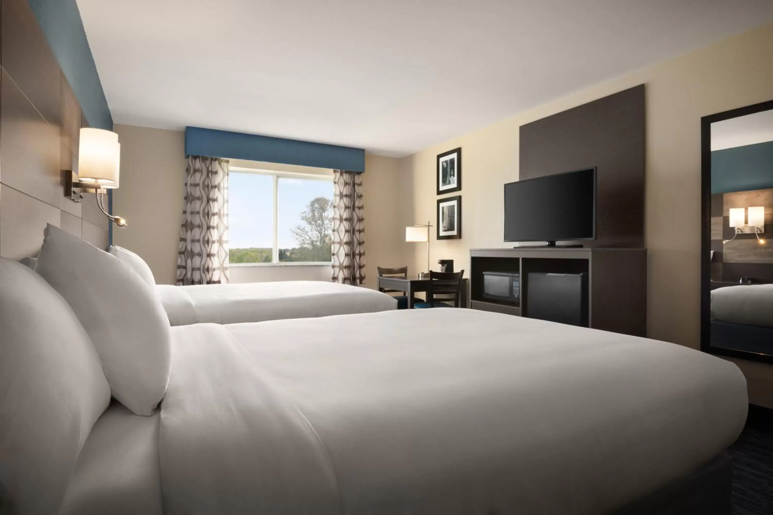 Guests, Bed in AmericInn by Wyndham Dodgeville