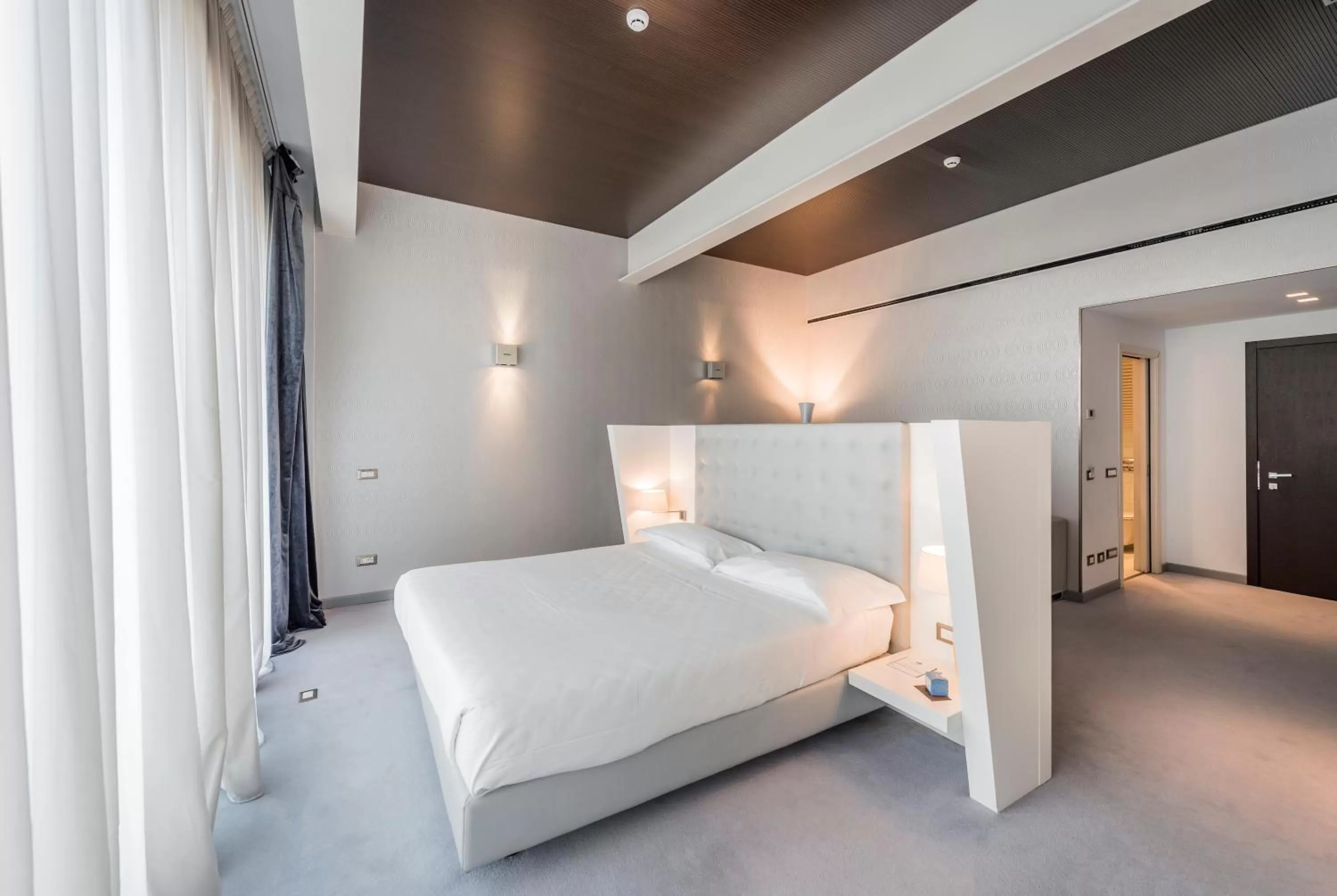 Photo of the whole room, Bed in Devero Hotel & Spa, BW Signature Collection