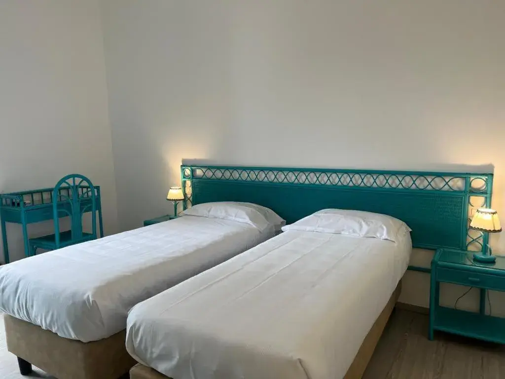 Bed in Hotel Baia Delle Sirene