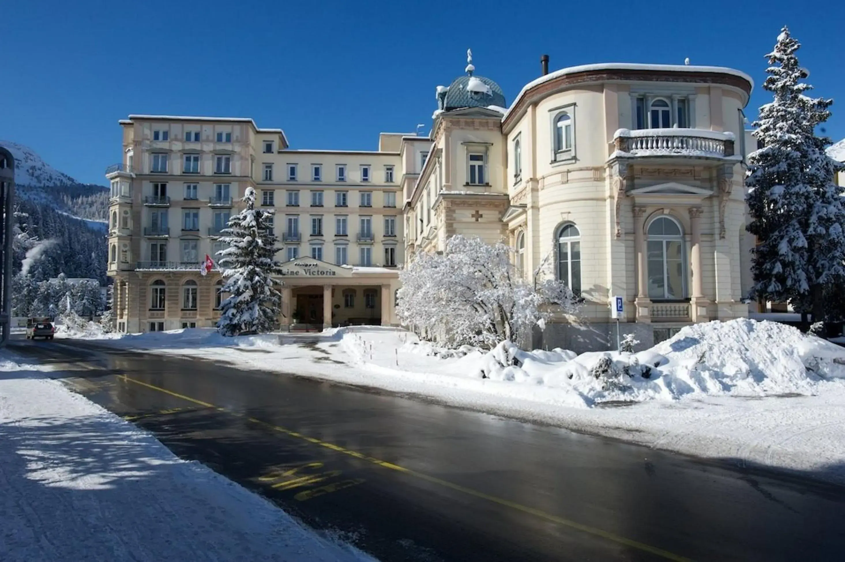 Facade/entrance, Winter in Hotel Reine Victoria by Laudinella