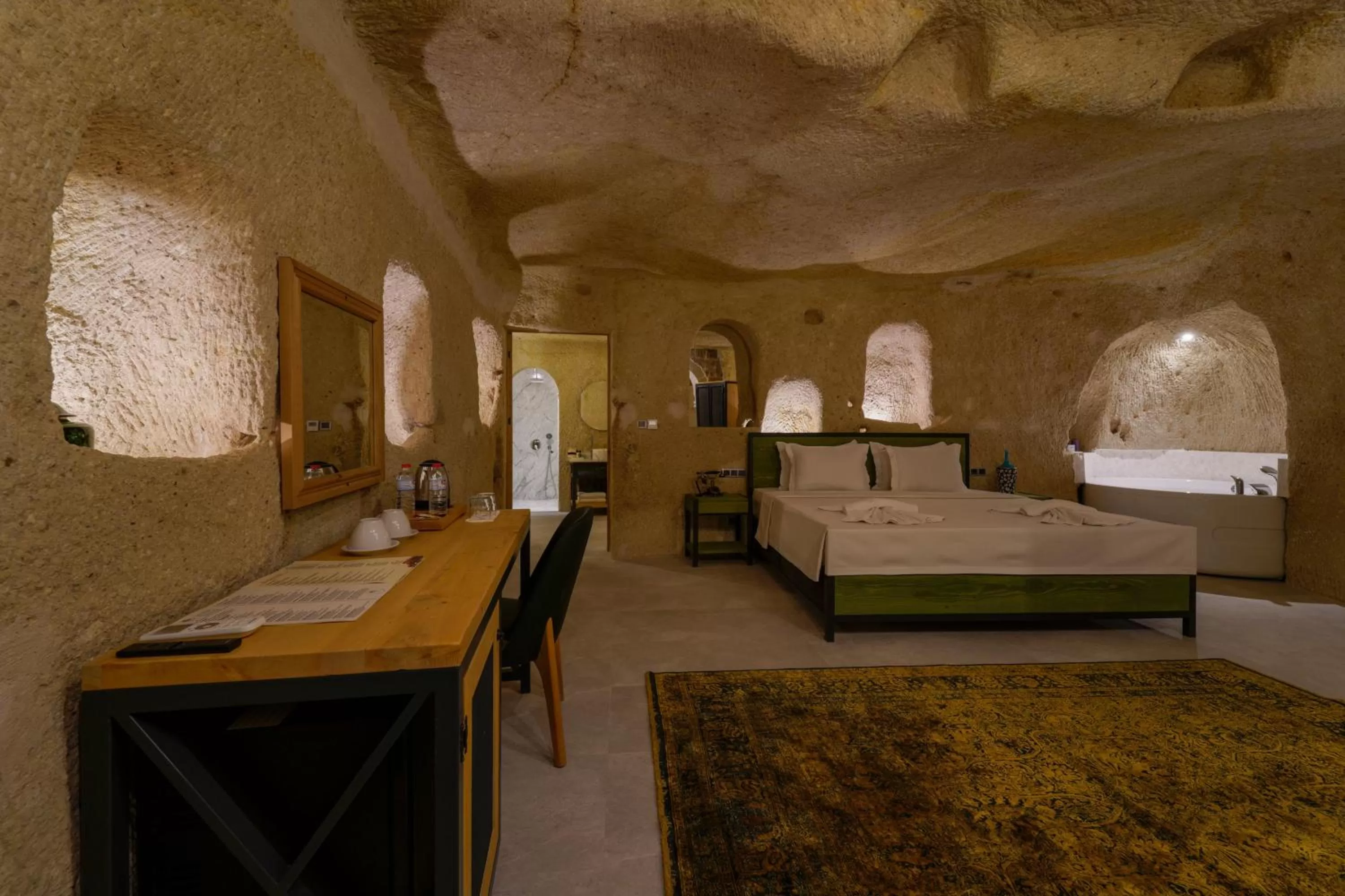 Bed in The Niche Cave Hotel