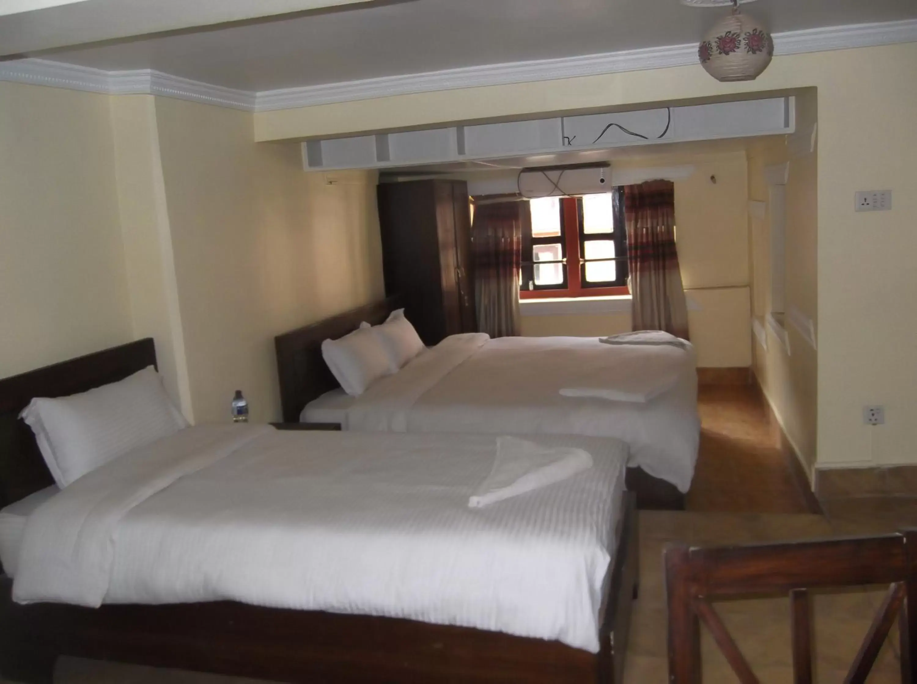 Photo of the whole room, Bed in Kathmandu Boutique Hotel