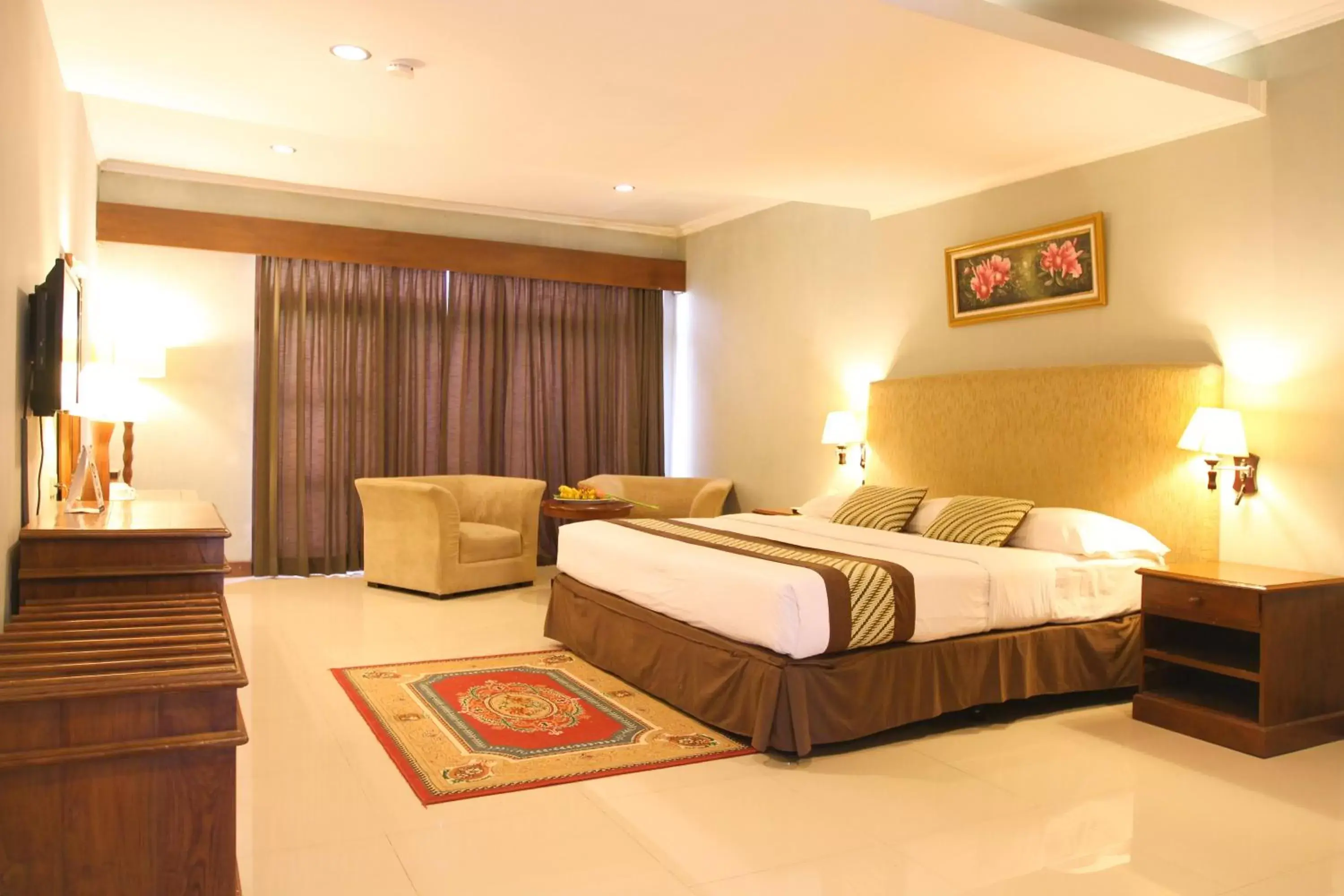 Bed in Cakra Kusuma Hotel