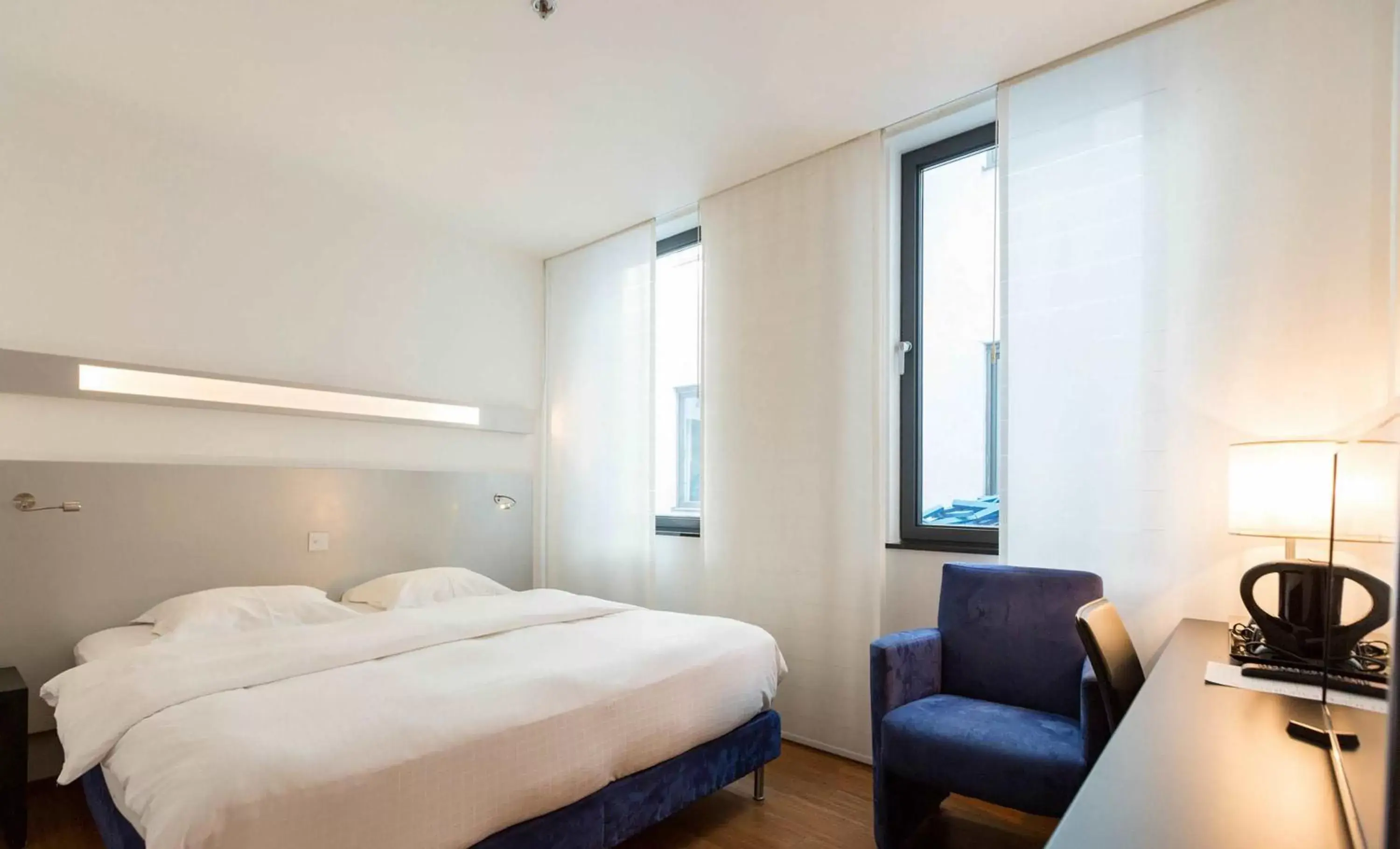 Bed in Aqua Hotel Brussels