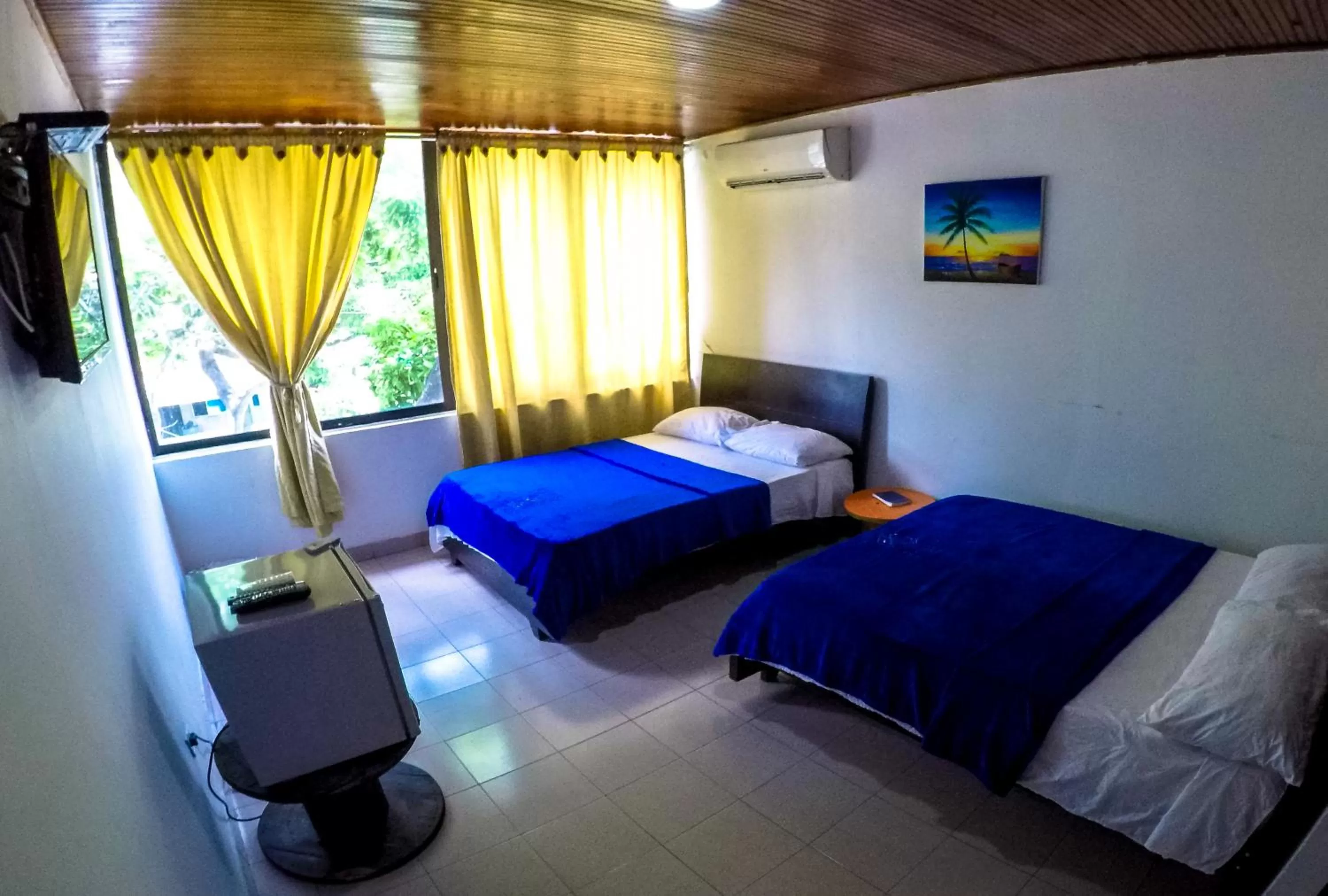 Bed in Posada Cultural Bahia Sonora