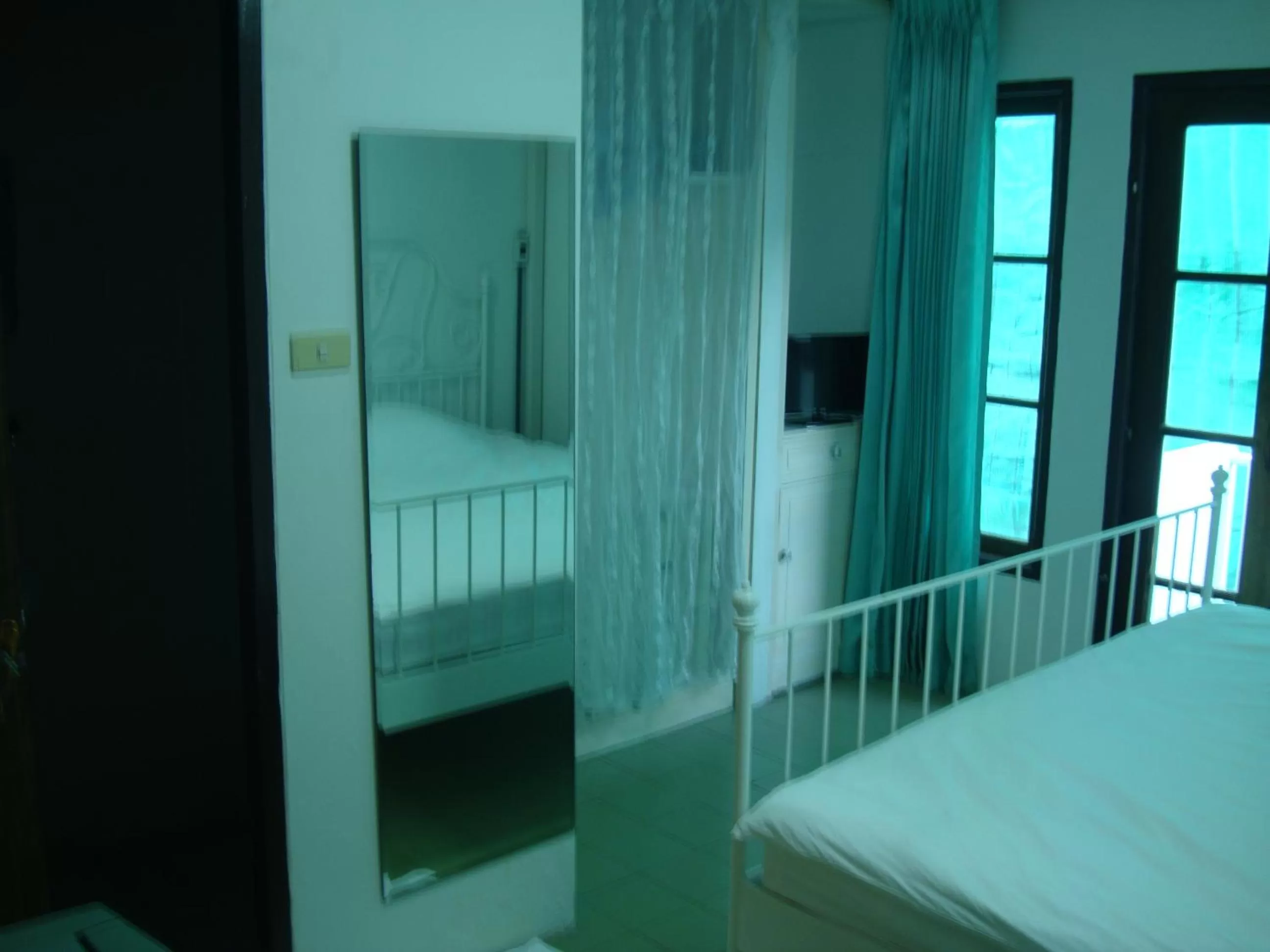 Bed in Oriental Smile Hotel