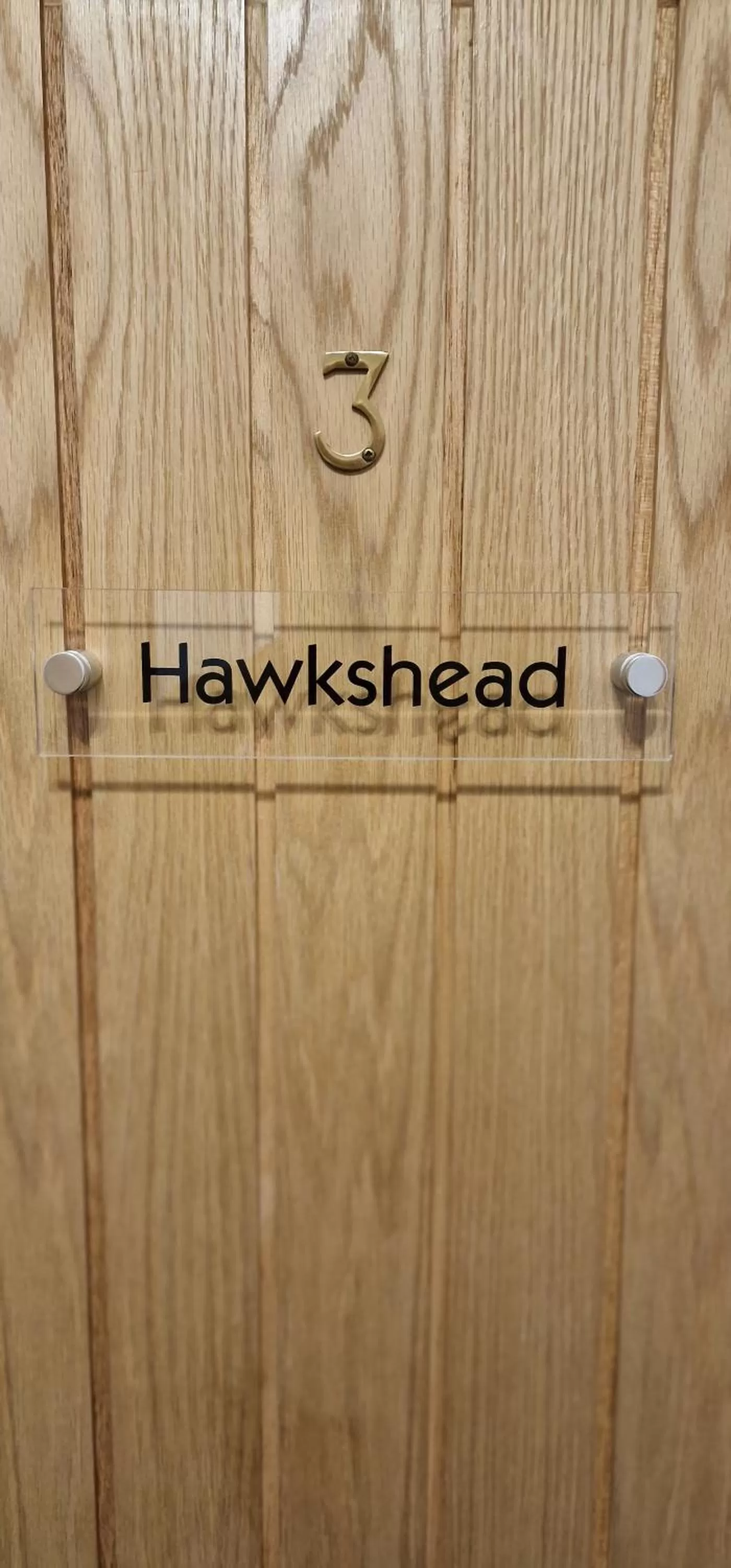 Property logo or sign in Bonny Brae House by Woodland Park