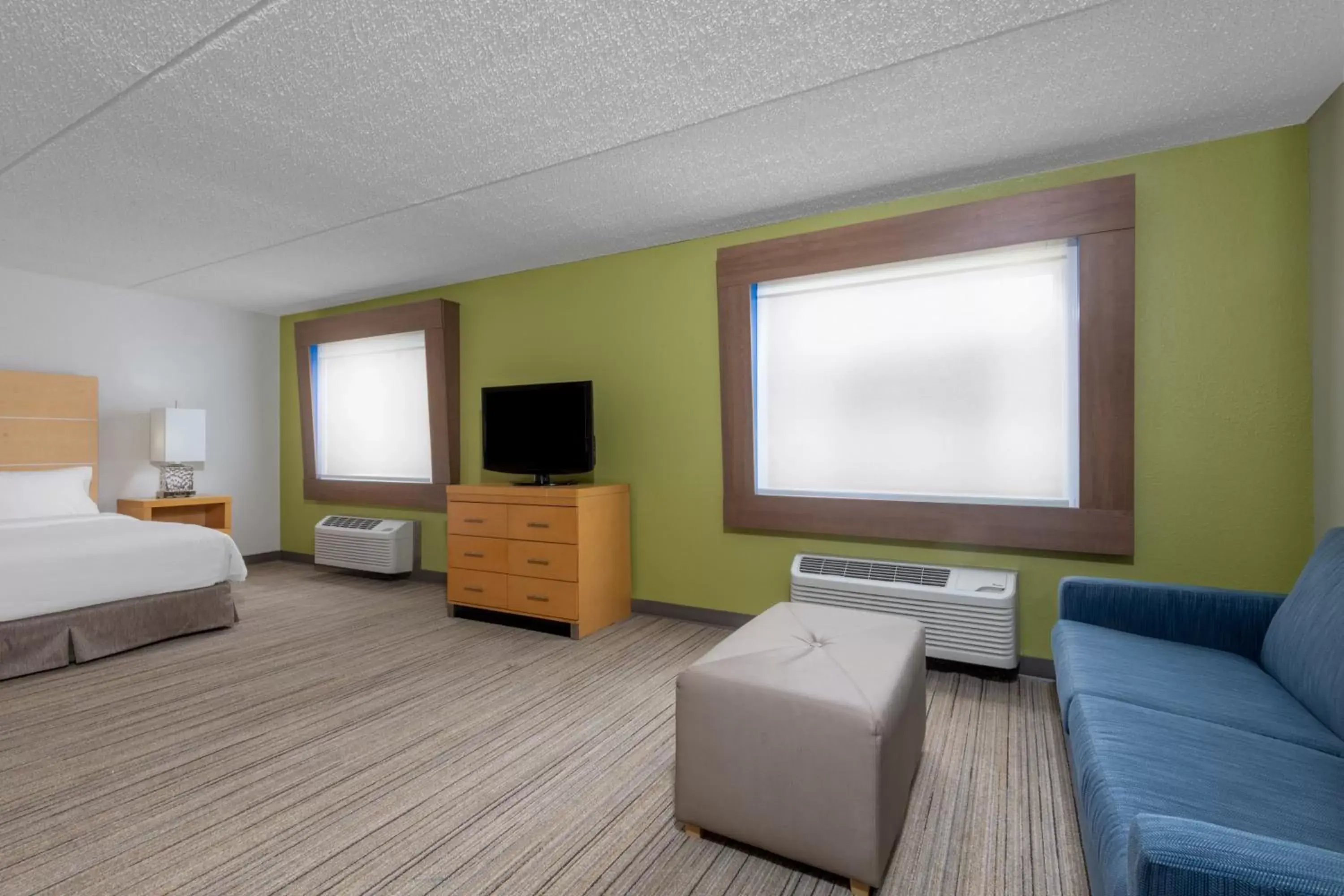 Photo of the whole room, TV/Entertainment Center in Holiday Inn Express & Suites Wheat Ridge-Denver West, an IHG Hotel