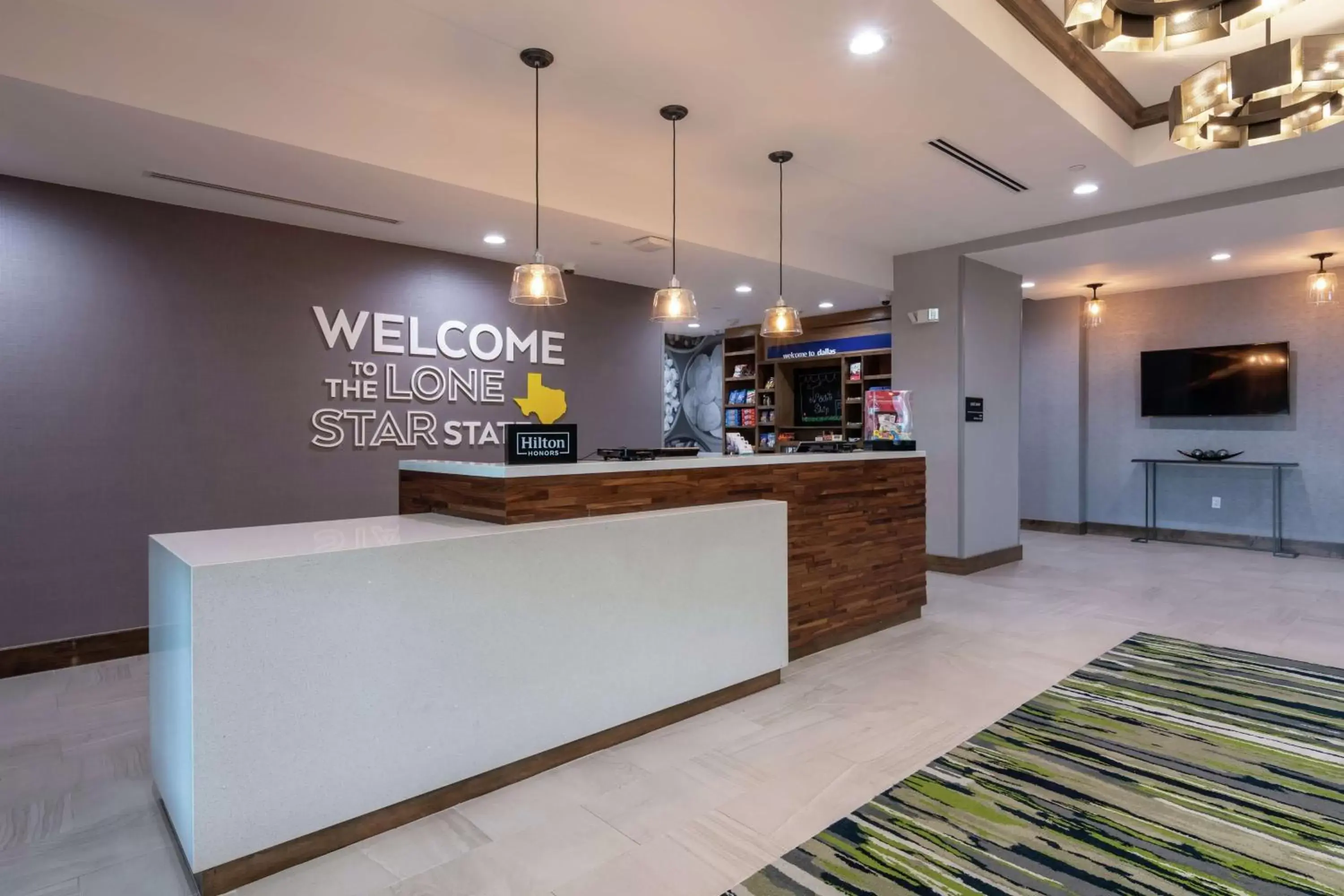 Lobby or reception in Hampton Inn & Suites Dallas East Lobby or reception in Hampton Inn & Suites Dallas East