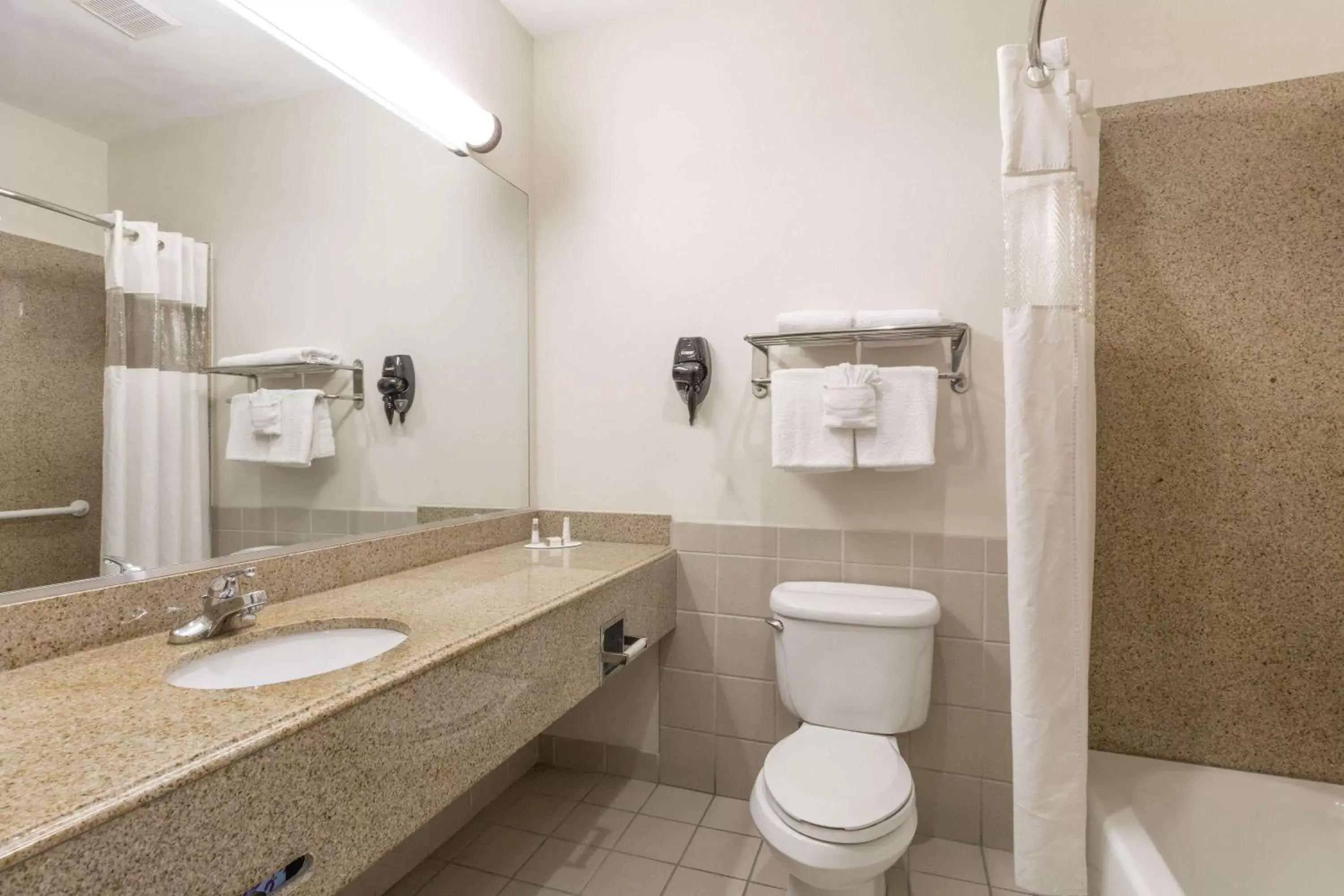 Bathroom in Baymont by Wyndham Galveston