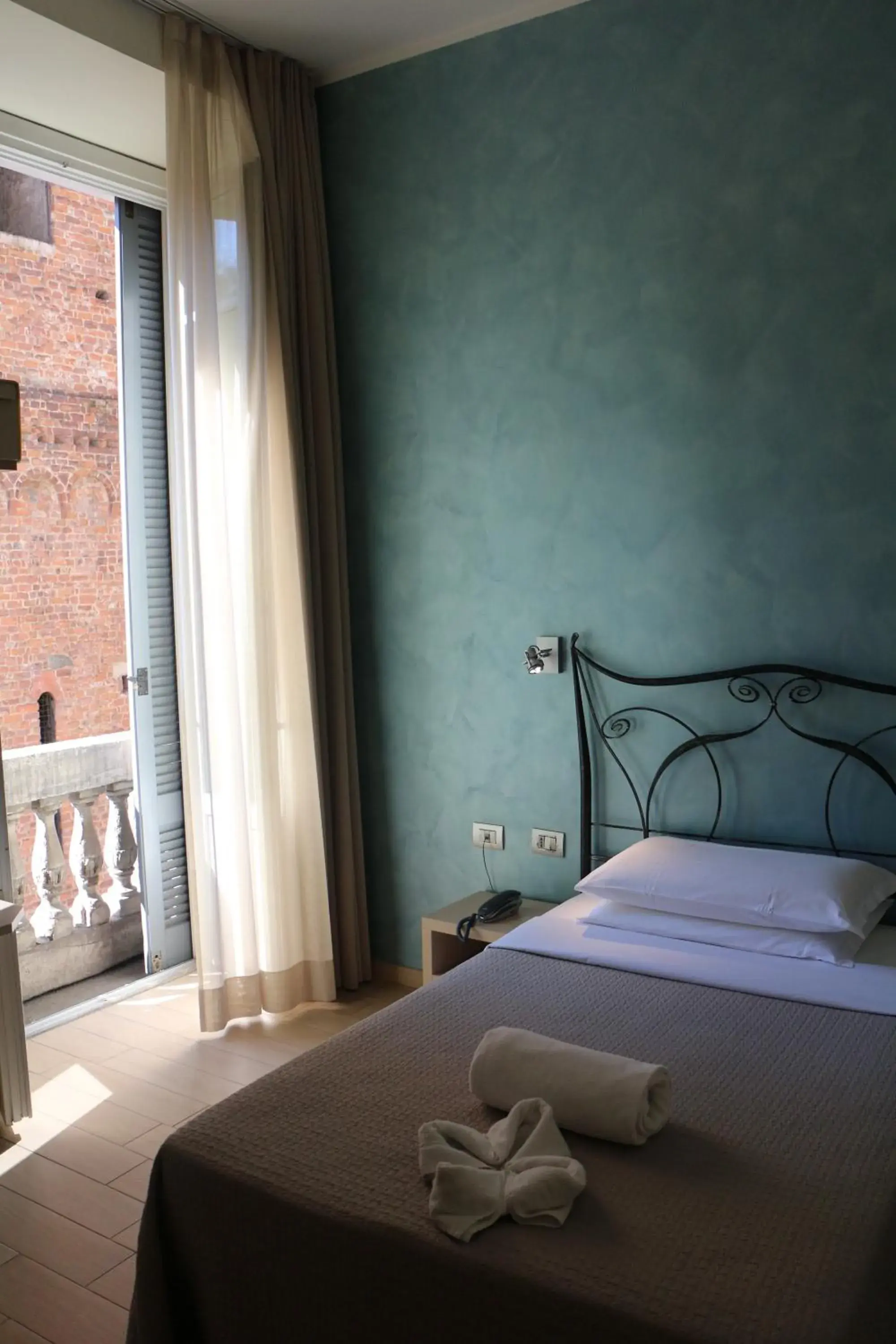 Bedroom, Bed in Hotel La Madonnina