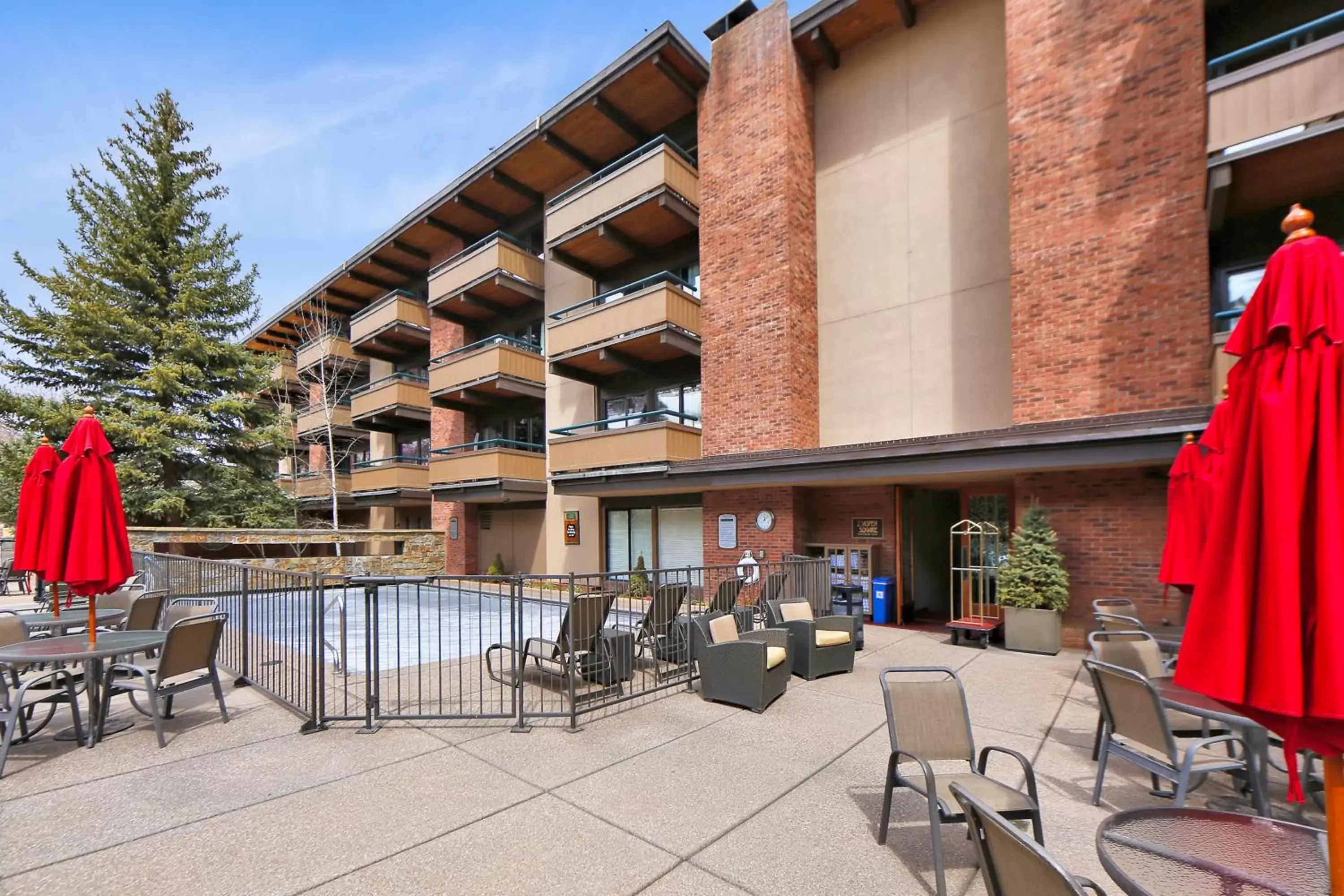 Pool view, Property Building in Aspen Square Condominium Hotel