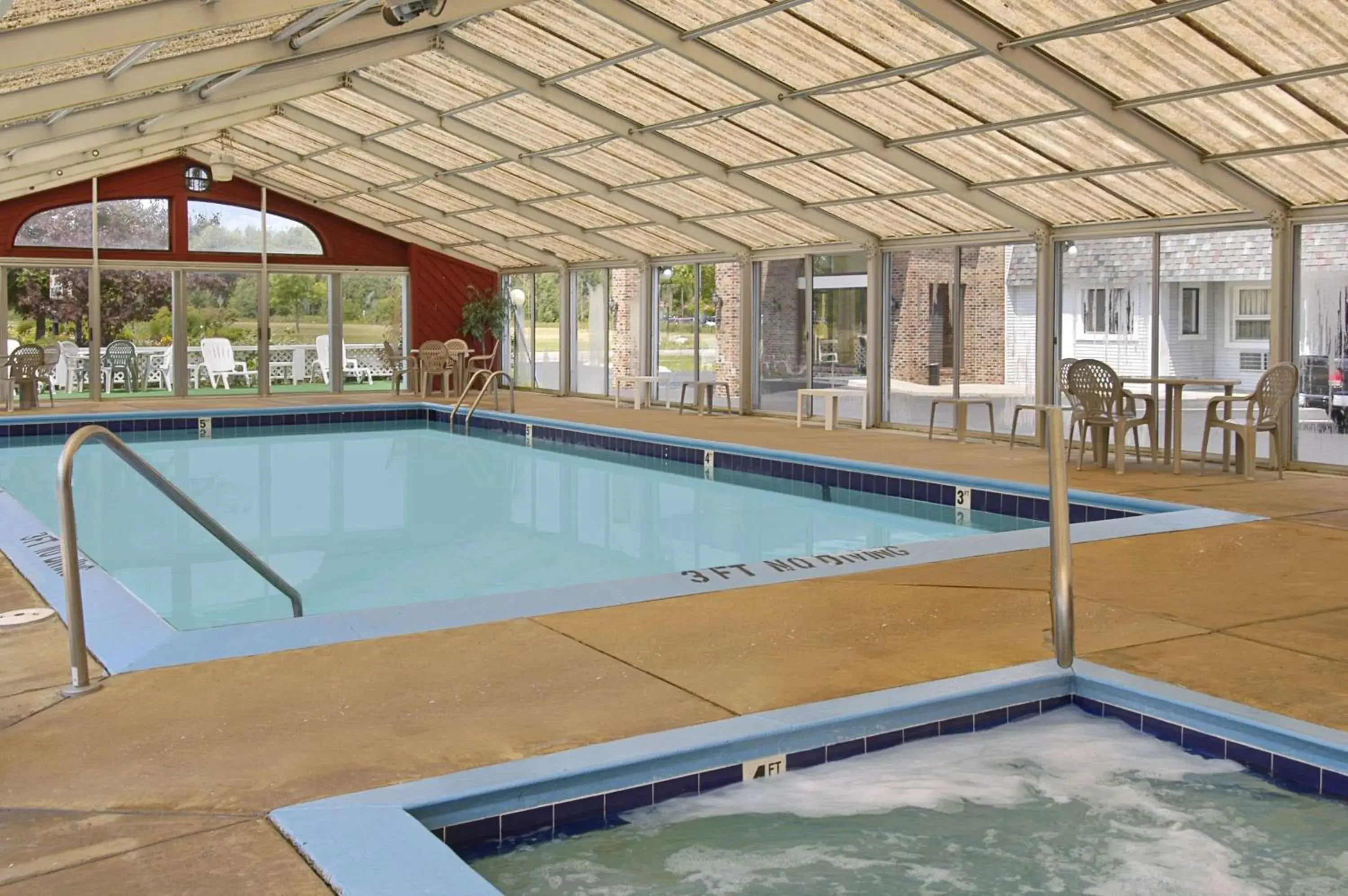 On site, Swimming Pool in Days Inn by Wyndham Mackinaw City - Lakeview