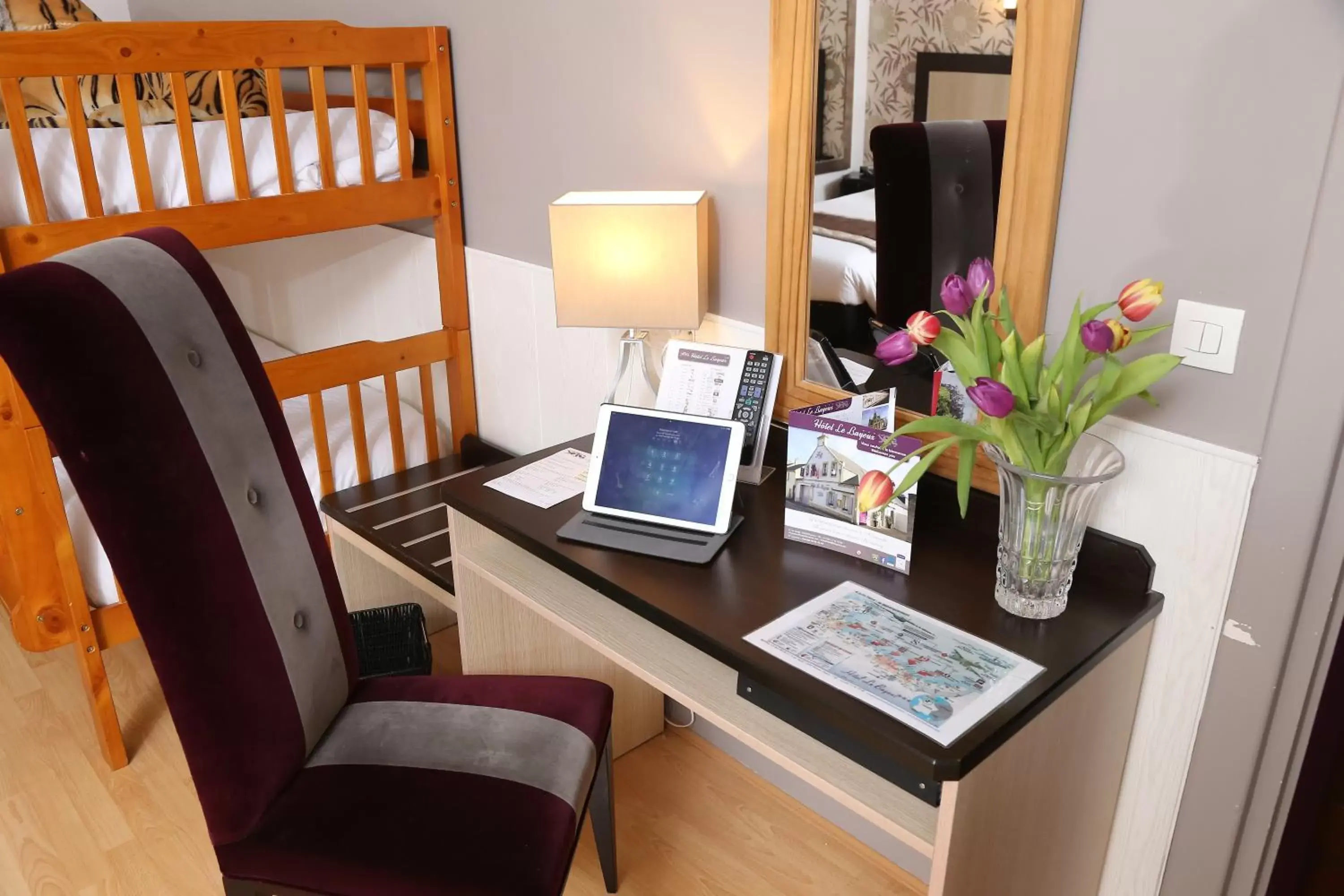 Photo of the whole room, TV/Entertainment Center in Hôtel Le Bayeux