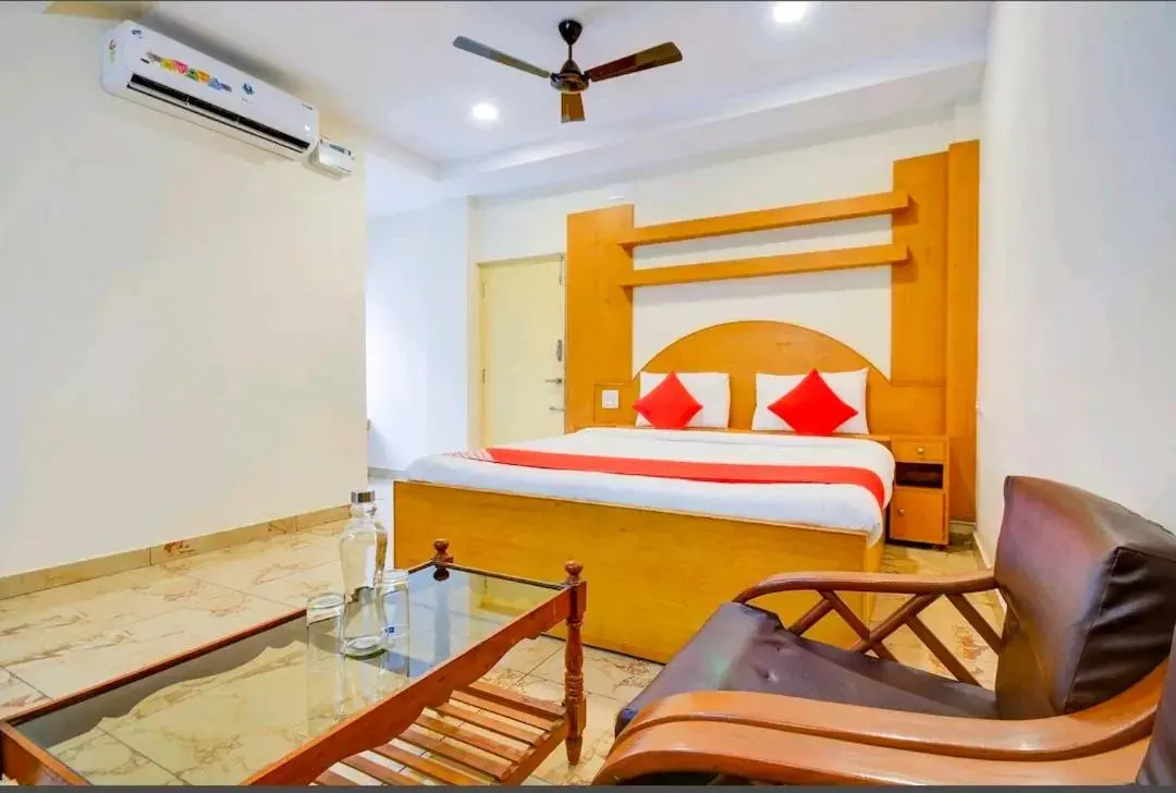 Photo of the whole room, Bed in Sri Krishnan Residency