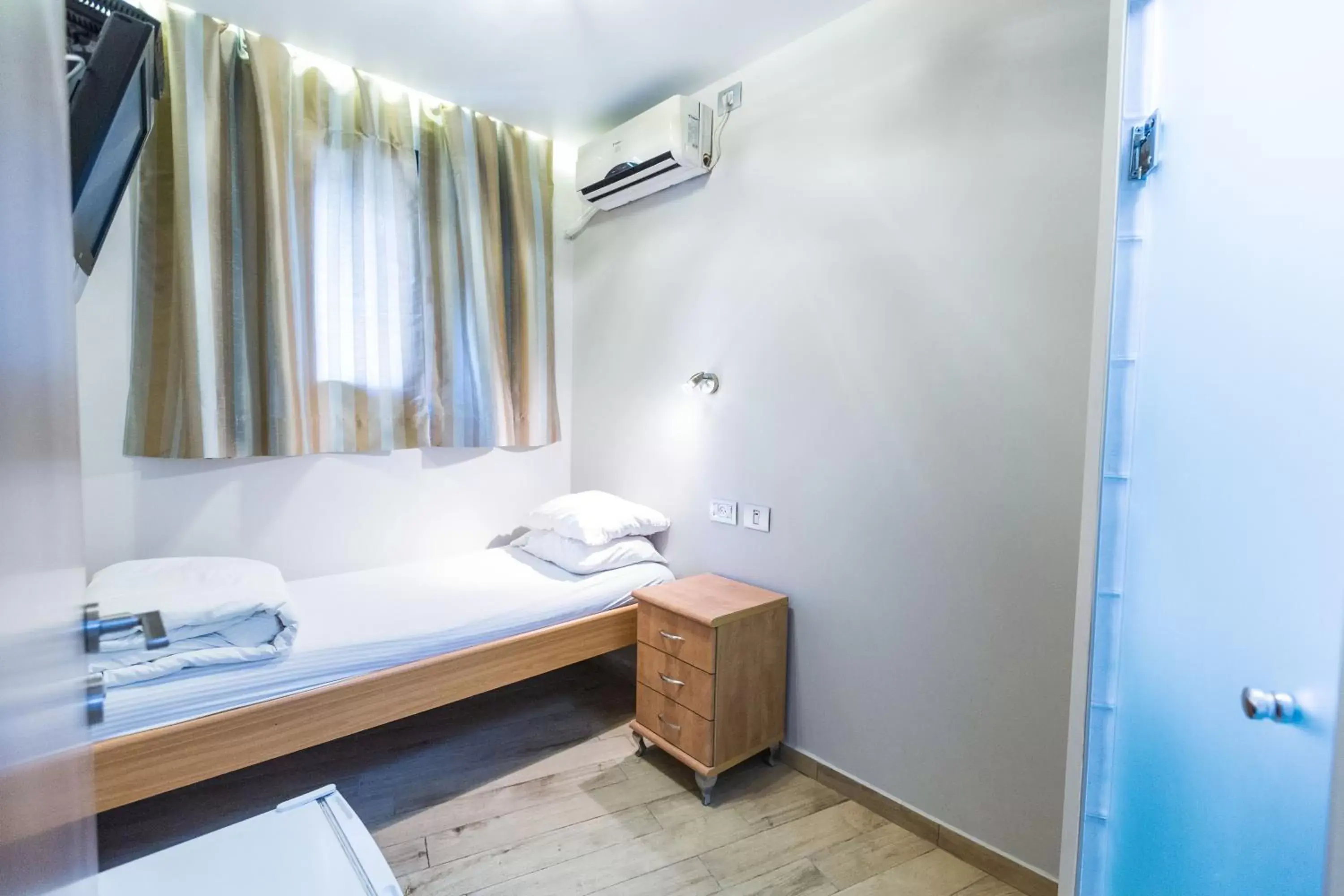 Bed in Kaplan Hotel Bed in Kaplan Hotel