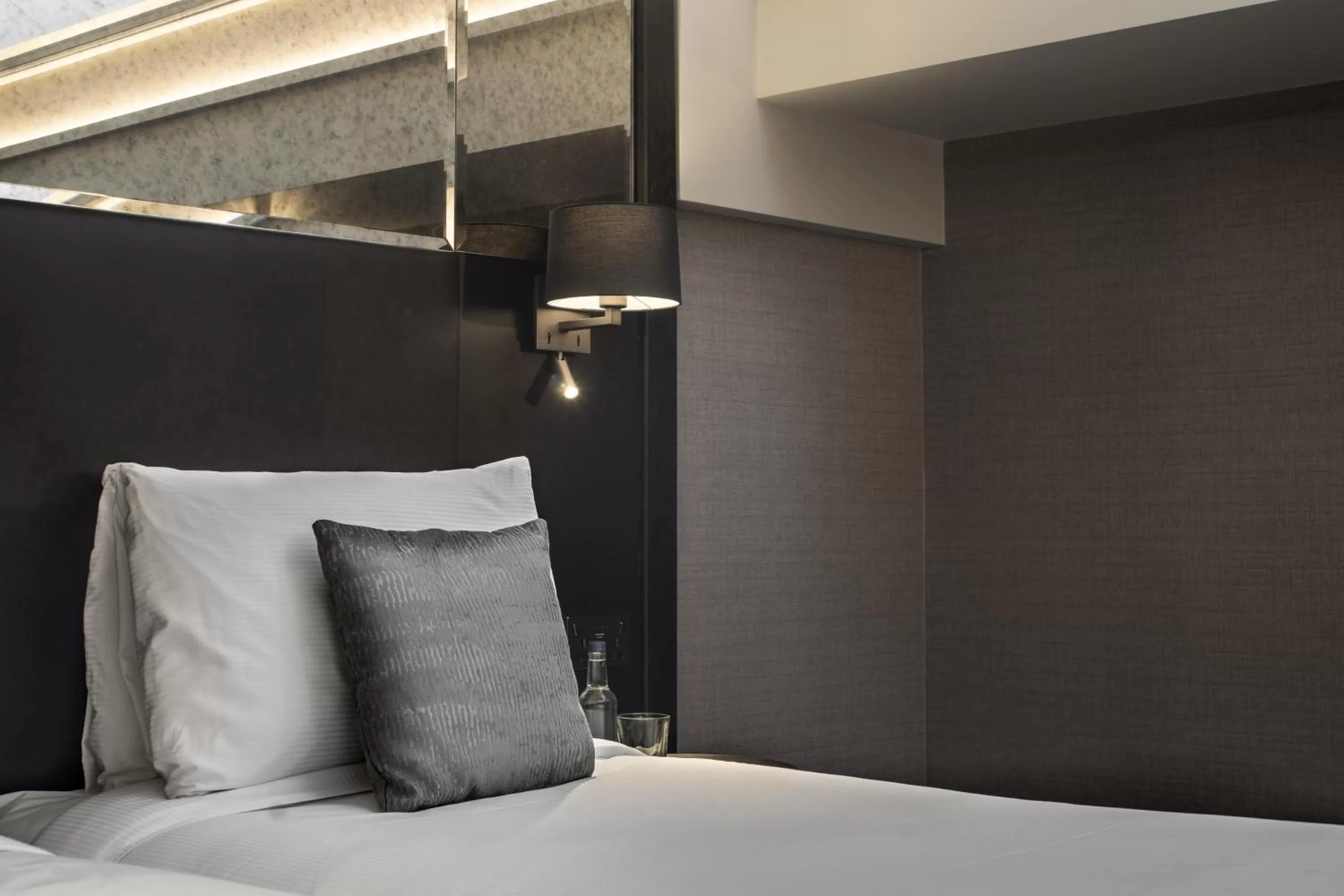 Decorative detail, Bed in Camden Enterprise Hotel