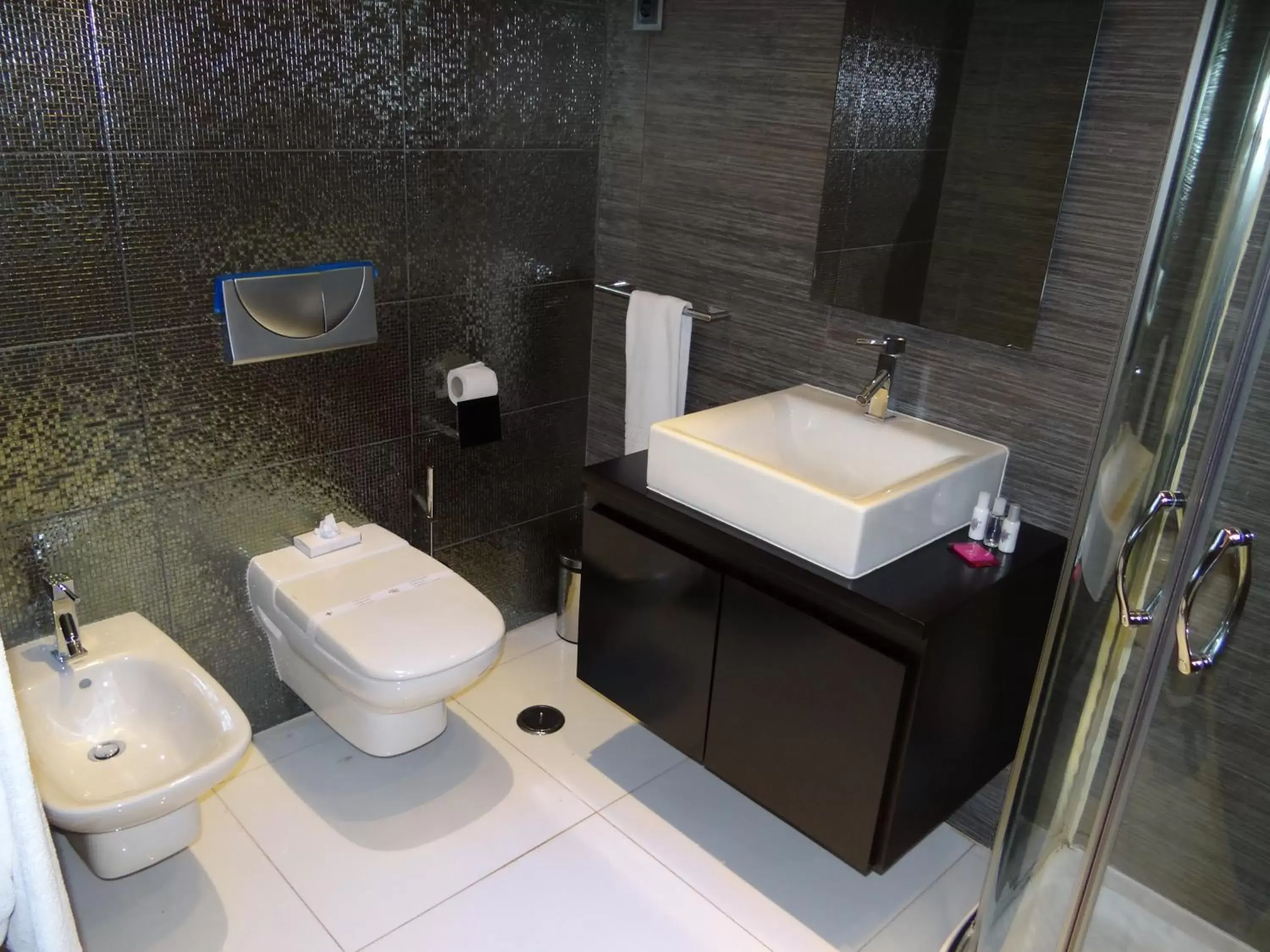 Bathroom in RK Suite Hotel Bathroom in RK Suite Hotel