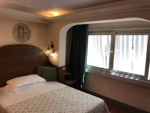 Bed in Hotel OKAPI
