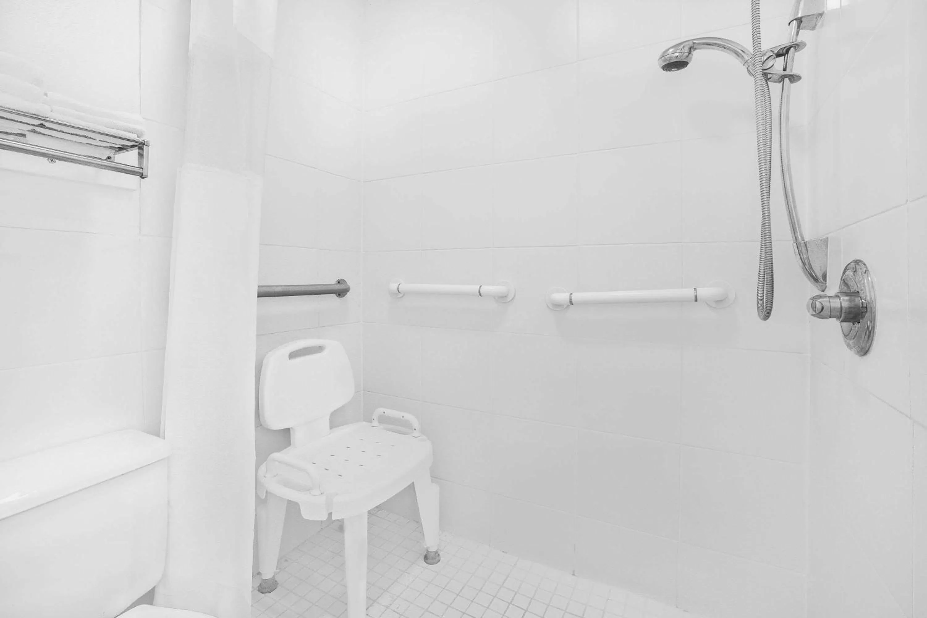 Bathroom in Days Inn by Wyndham Market Center Dallas Love Field