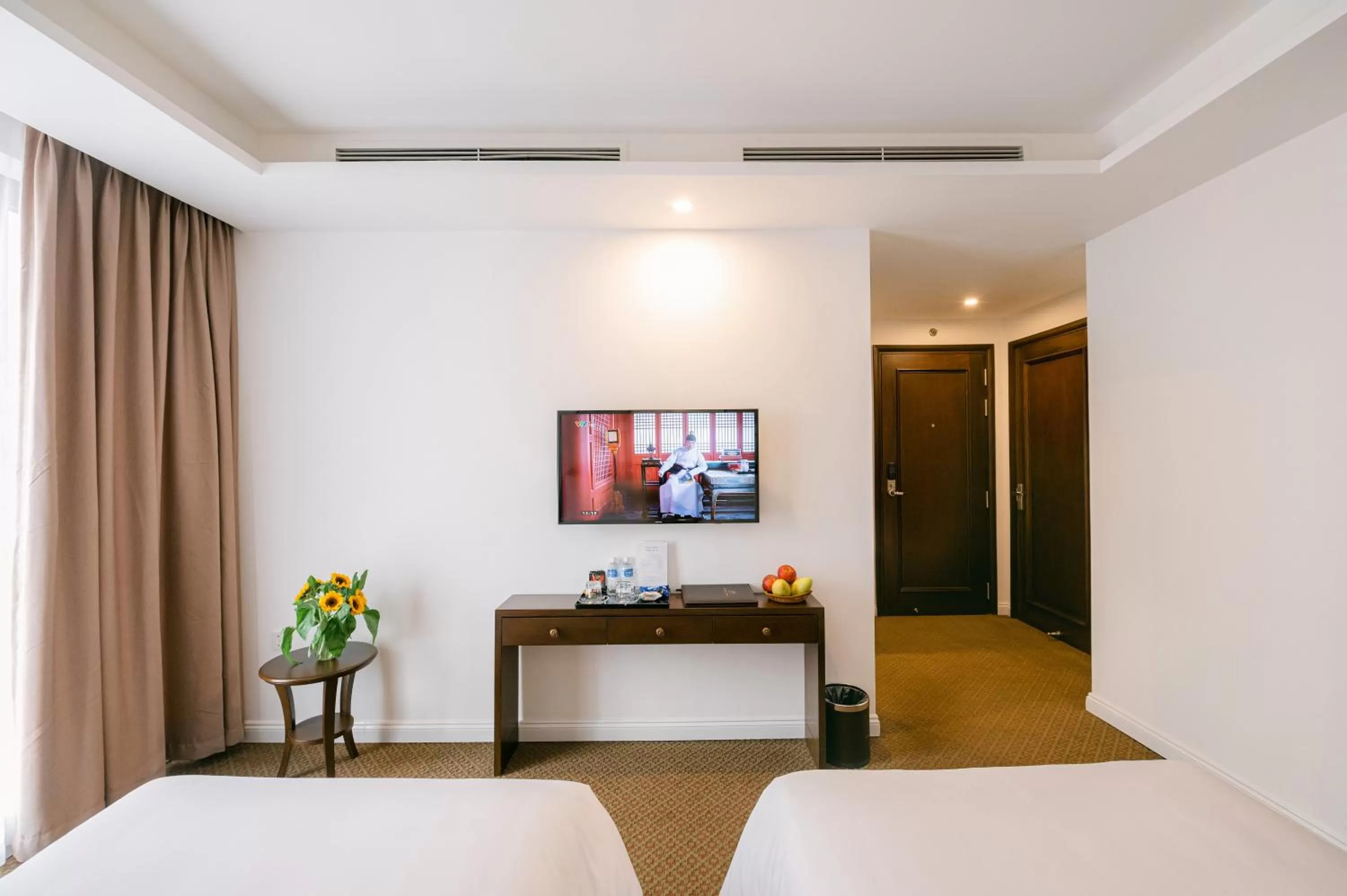 Living room, Bed in Marigold Hotel Hanoi