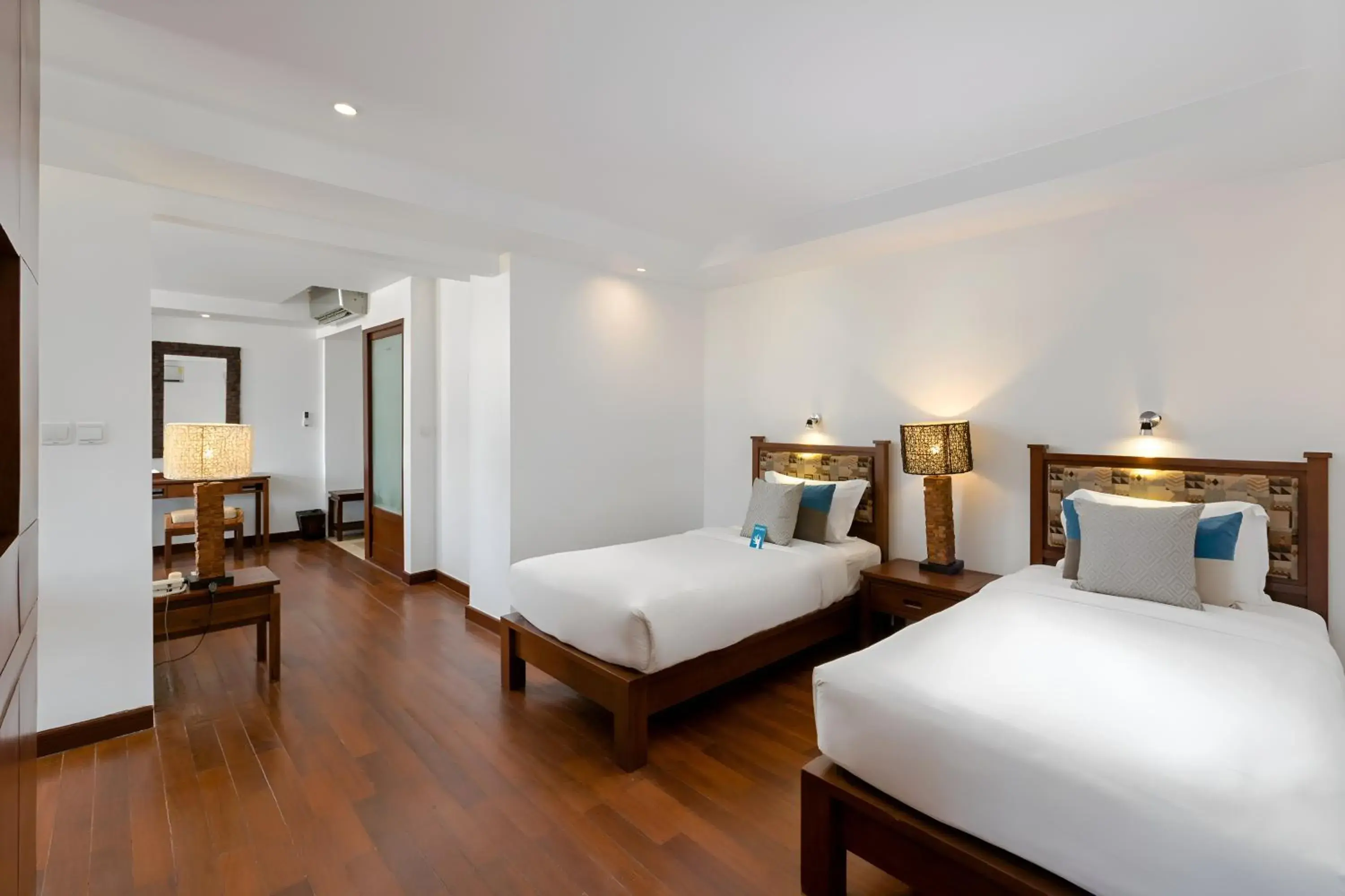 Bed in Baan Laimai Beach Resort & Spa - SHA Extra Plus Bed in Baan Laimai Beach Resort & Spa - SHA Extra Plus