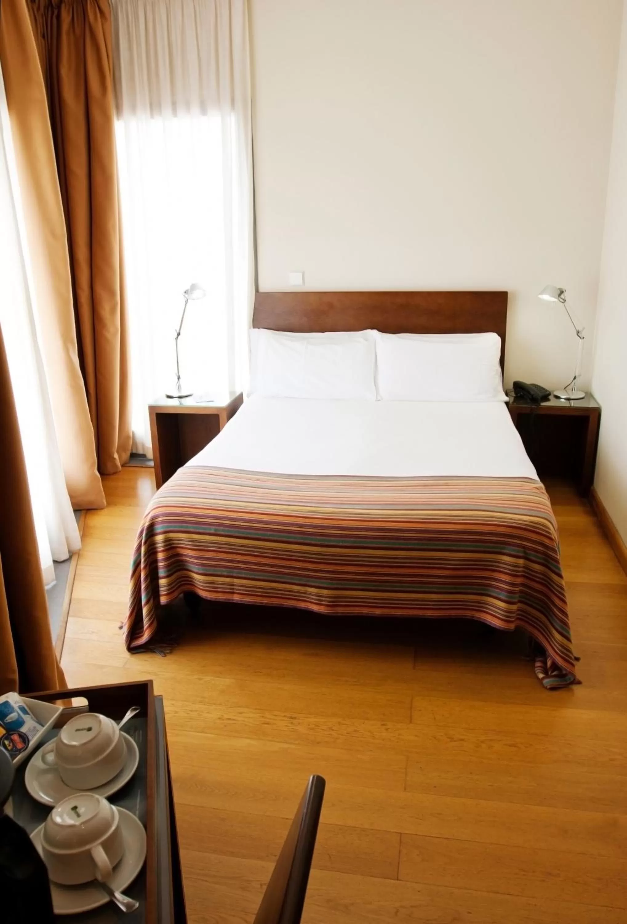 Photo of the whole room, Bed in Hotel Apartamentos Patagonia Sur