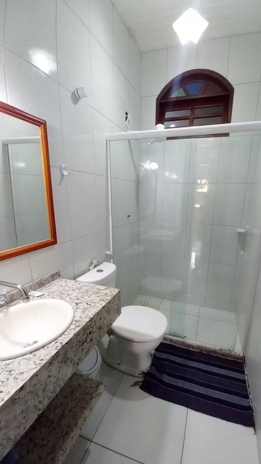 Bathroom in Pousada Recanto Das Emerências