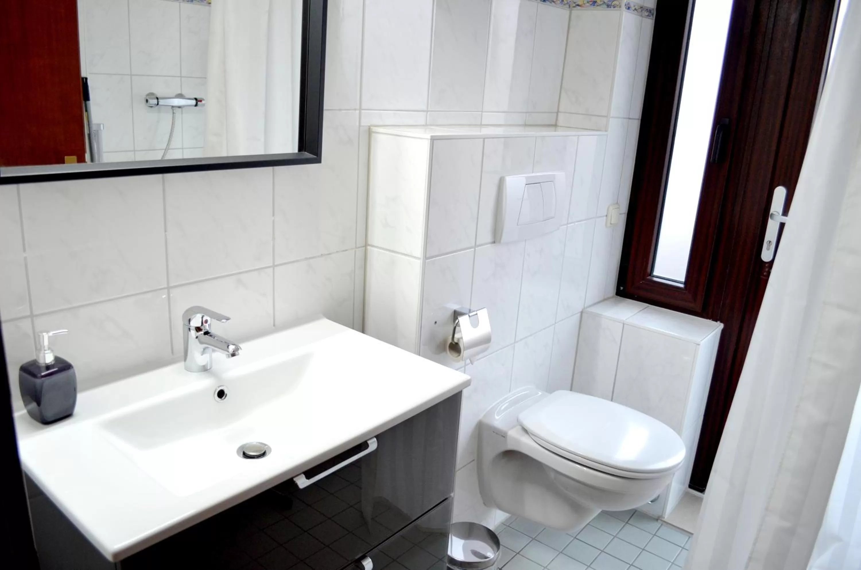 Toilet in Hana Aparthotel