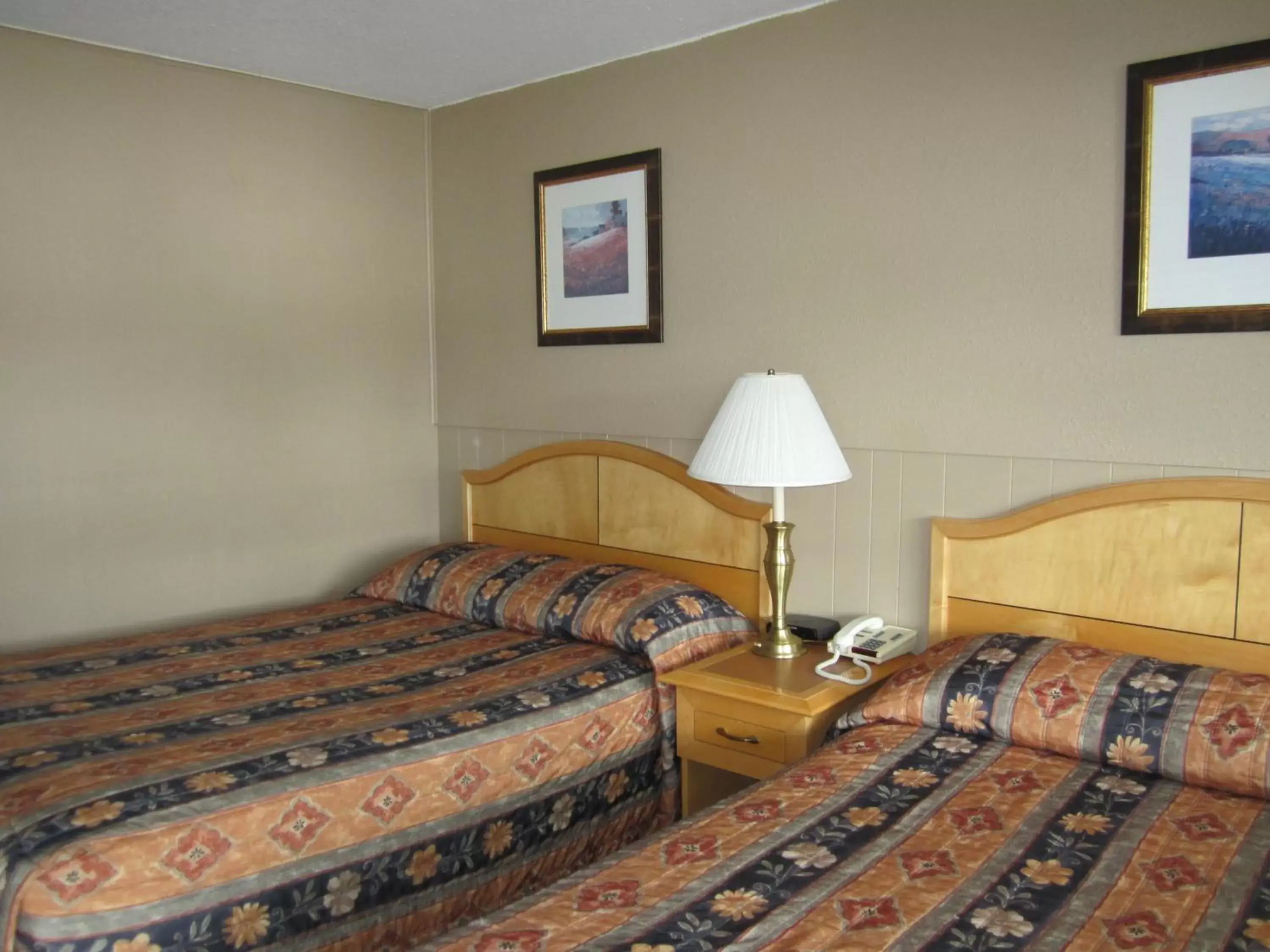 Bed in Bulkley Valley Motel