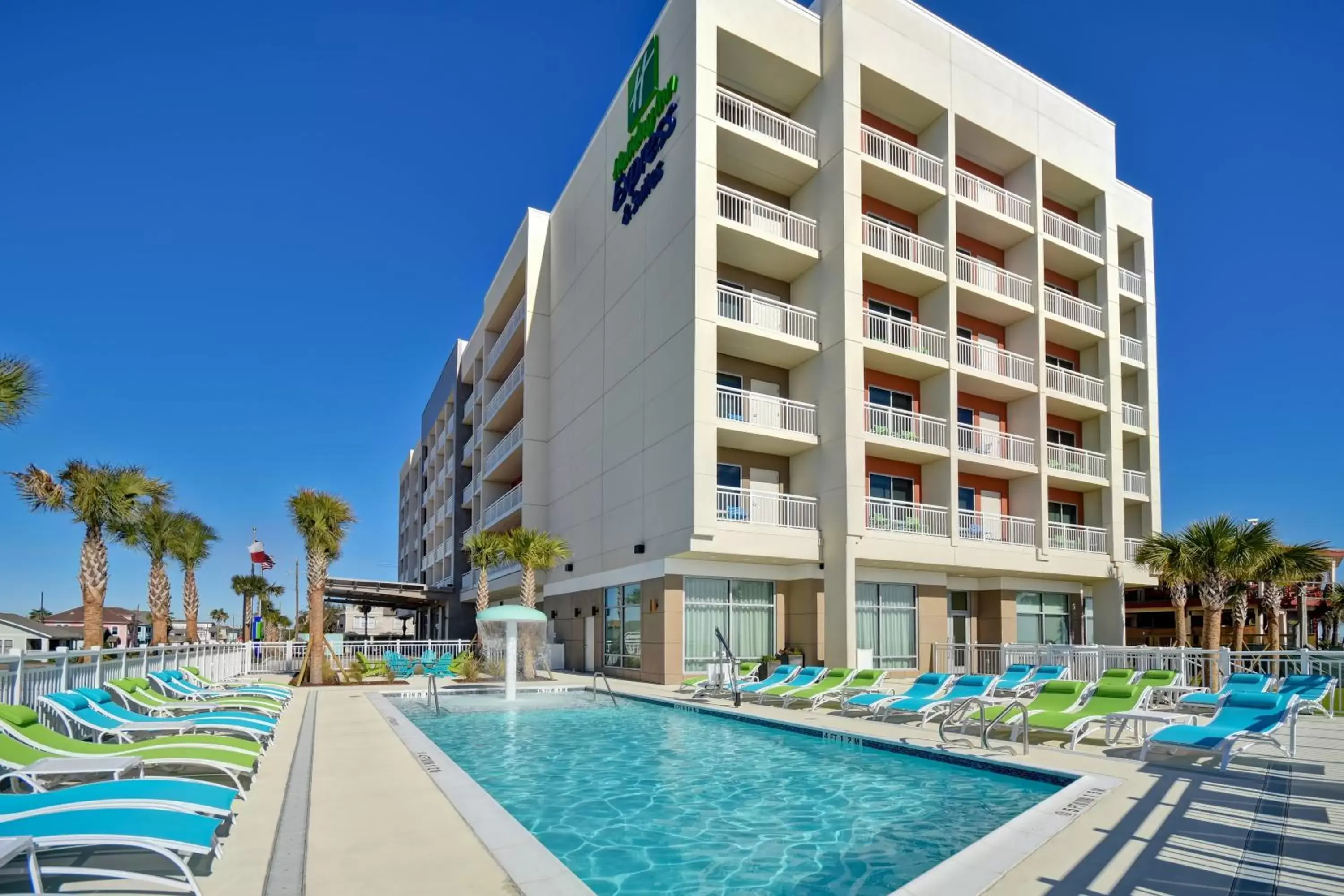 Property building, Swimming Pool in Holiday Inn Express & Suites - Galveston Beach, an IHG Hotel