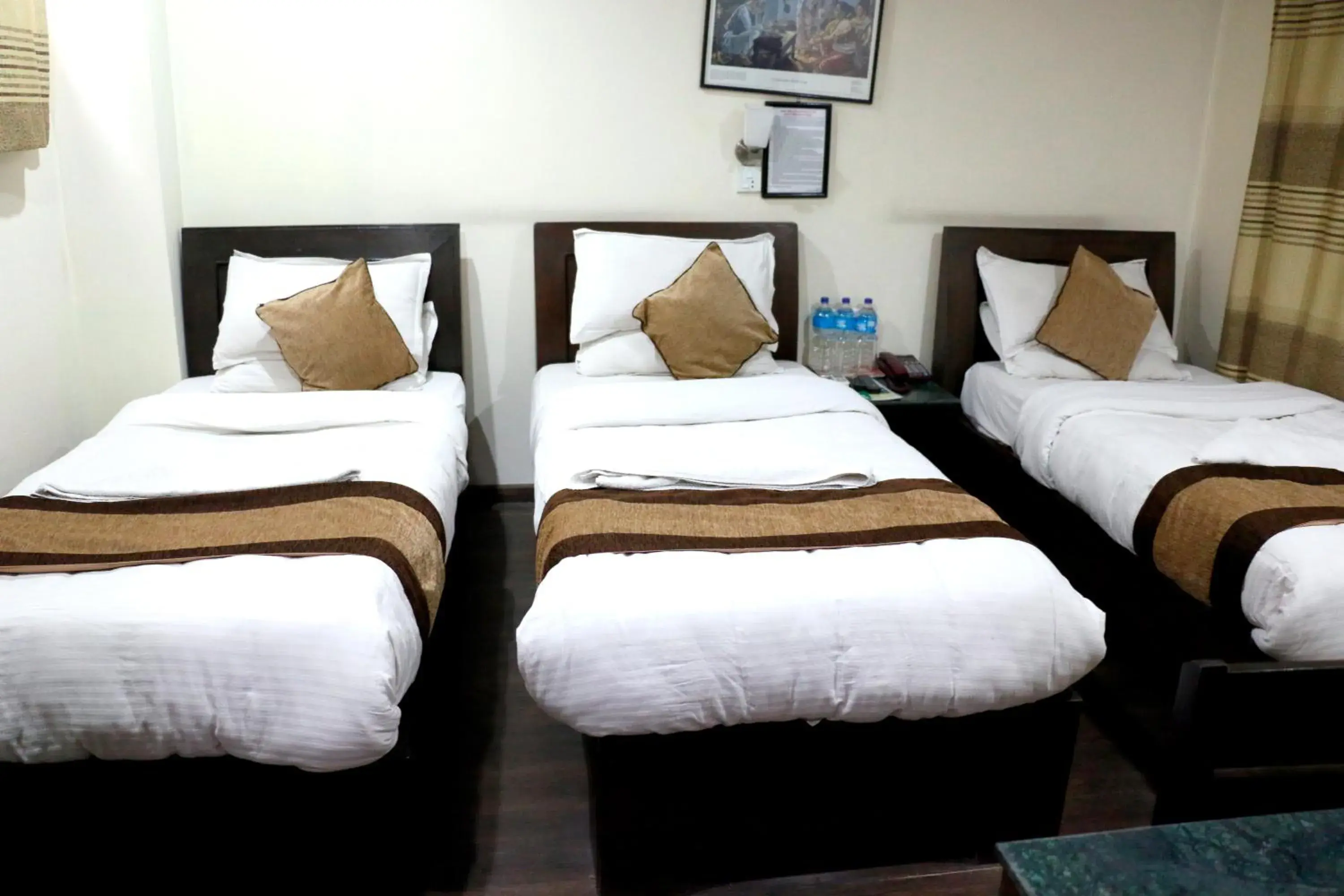 Bed in Alpine Hotel & Apartment