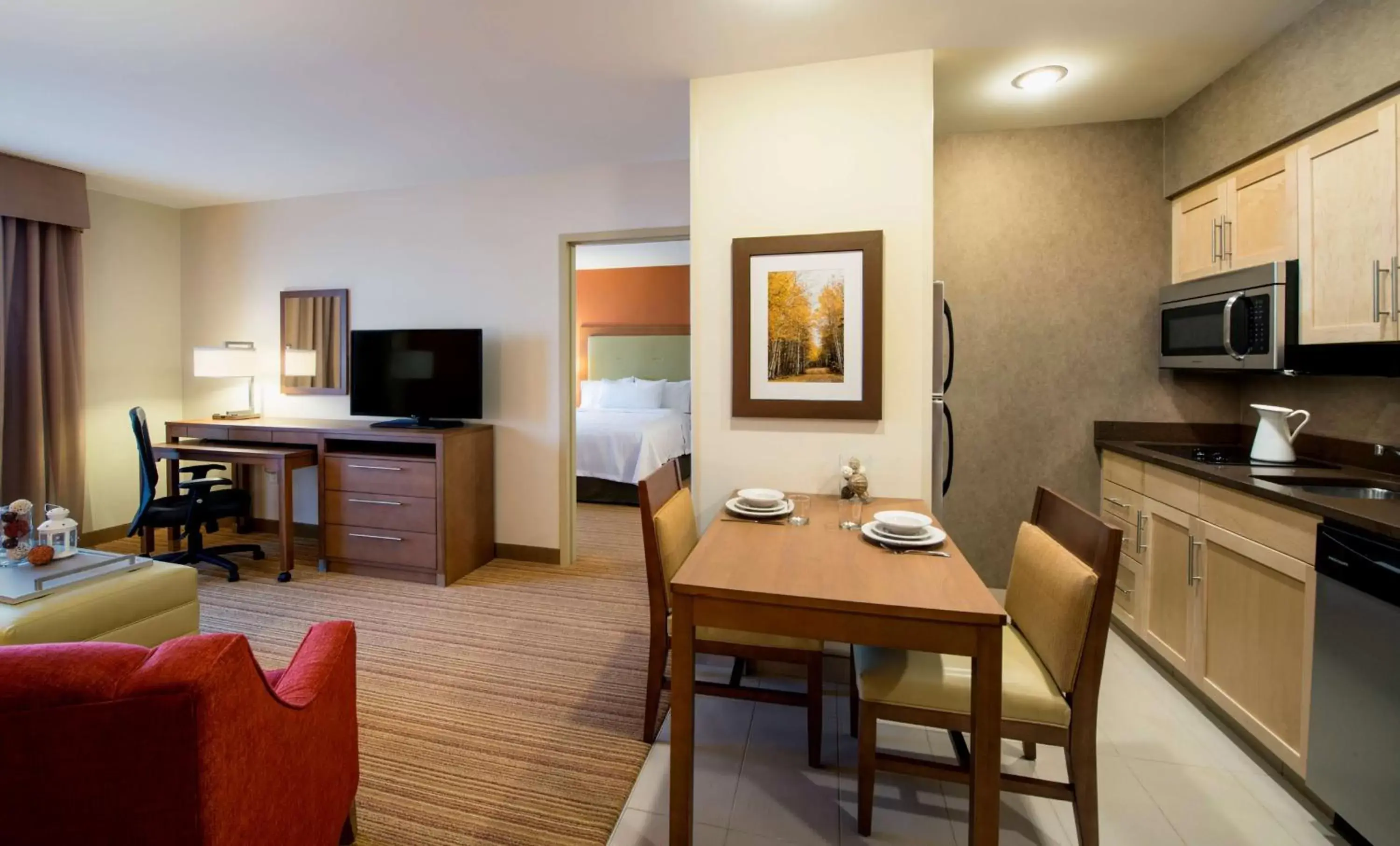 Bedroom, TV/Entertainment Center in Homewood Suites by Hilton Winnipeg Airport - Polo Park