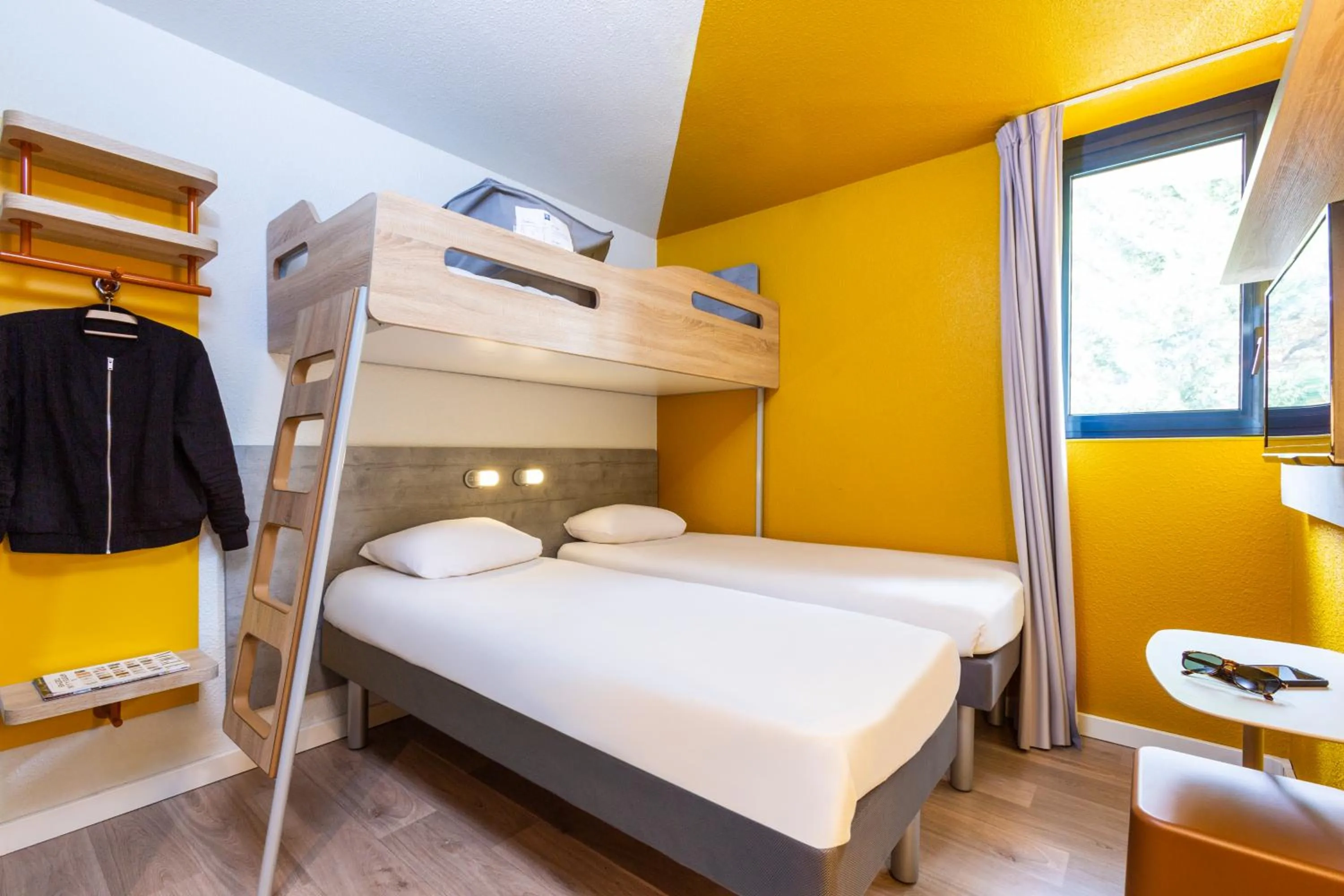 Bathroom, Bed in ibis budget Marne La Vallée Noisy Le Grand