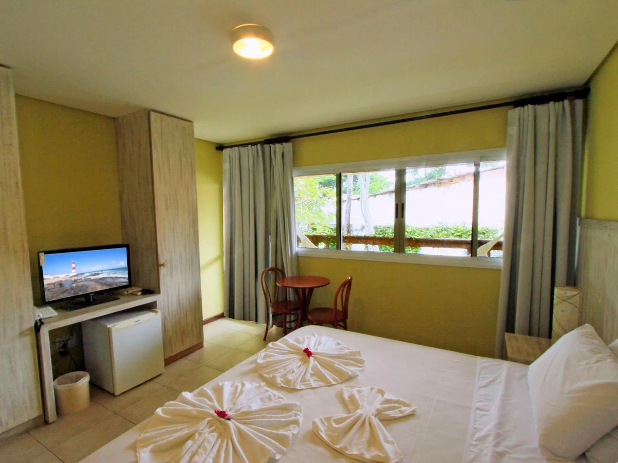 Bed in Farol de Itapuã Praia Hotel