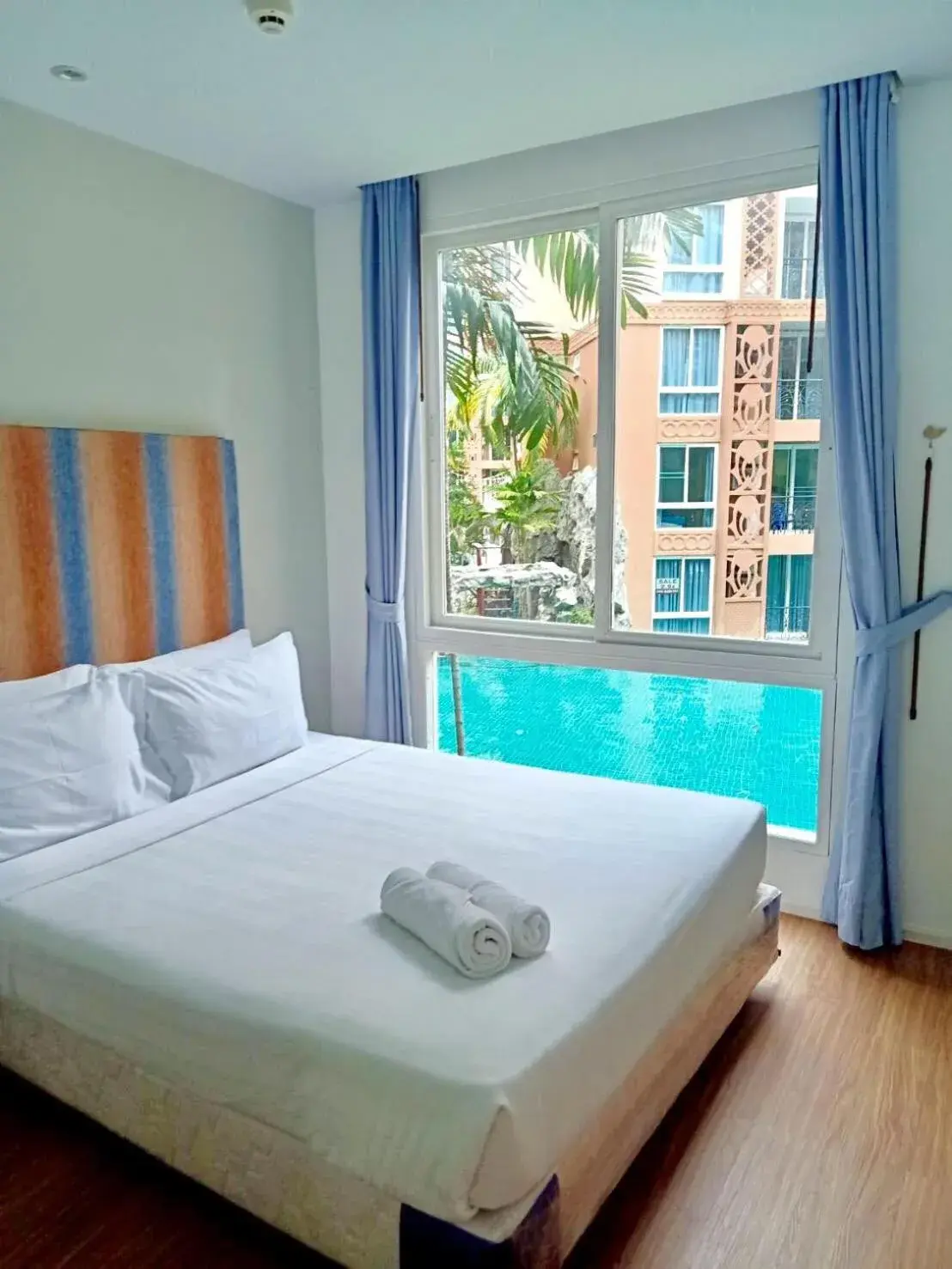 Bed in Atlantic Condo Resort Pattaya by Panisara