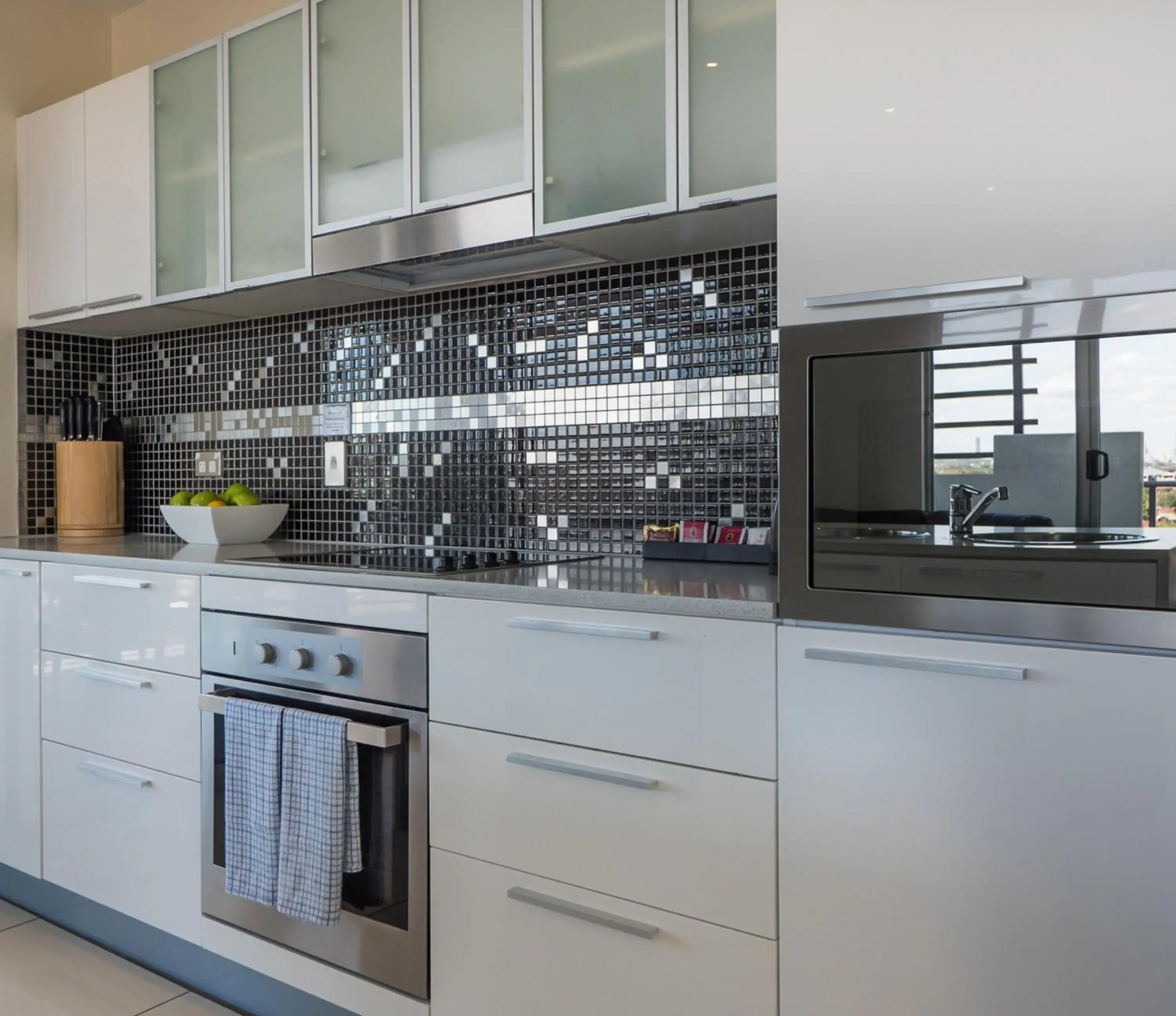 Kitchen or kitchenette, Kitchen/Kitchenette in The Chermside Apartments