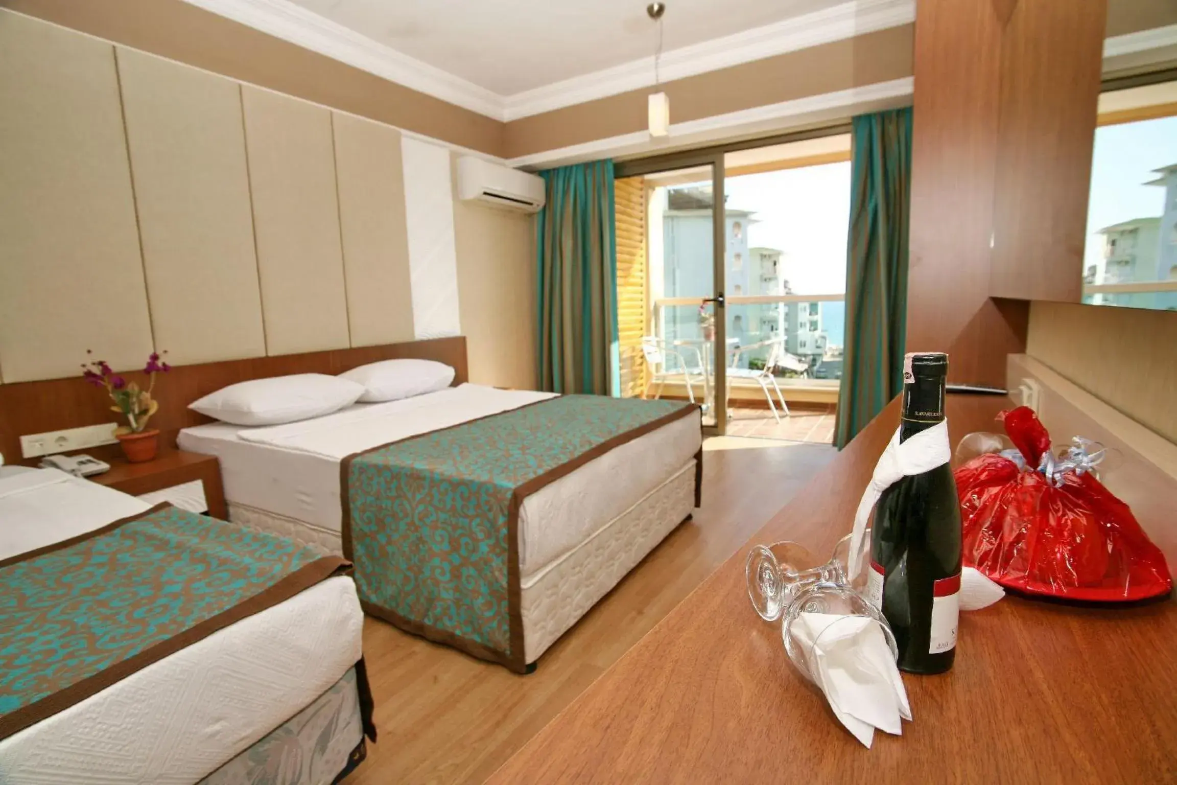 Bed in Tac Premier Hotel & Spa