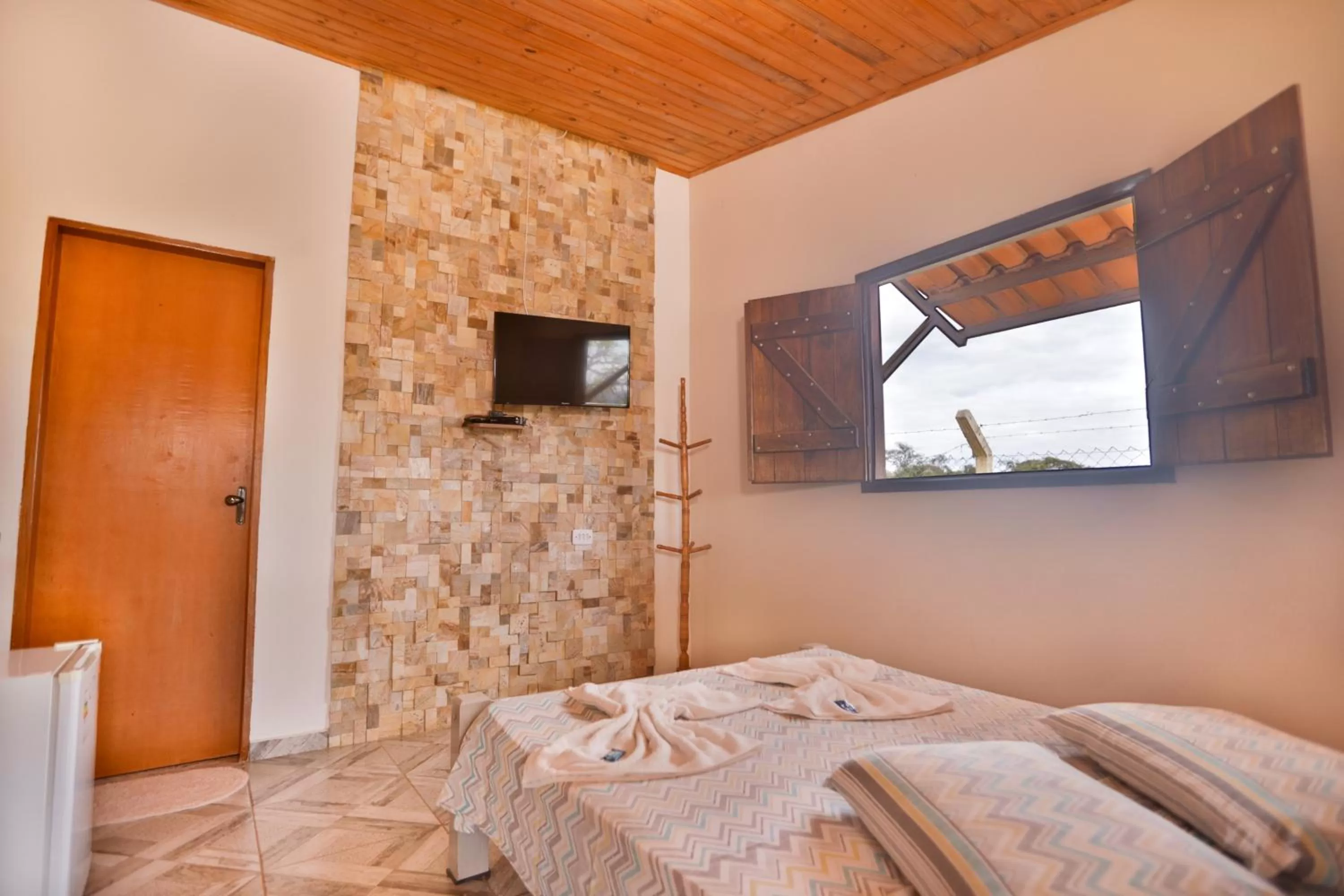 Bed in Pousada e Chales Por do Sol