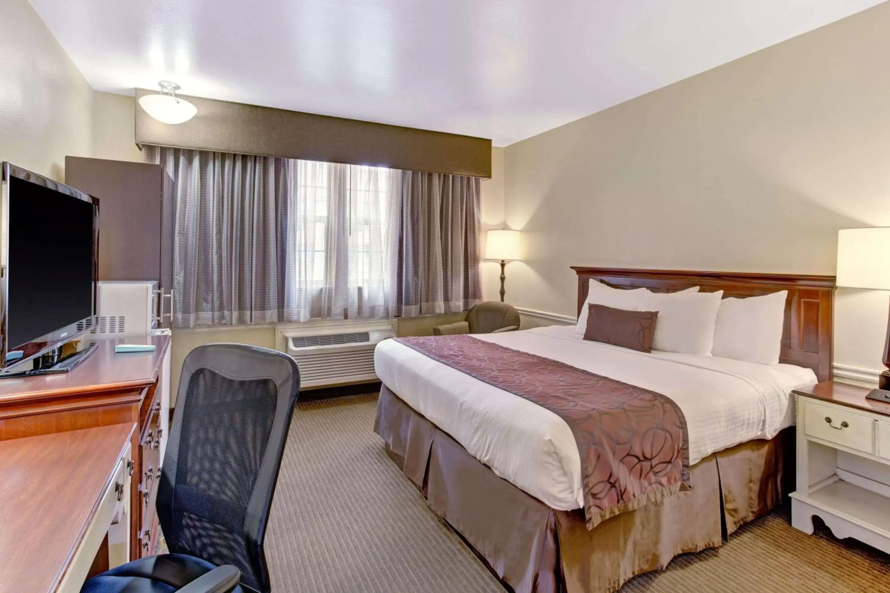 Photo of the whole room, Bed in Baymont by Wyndham Provo River