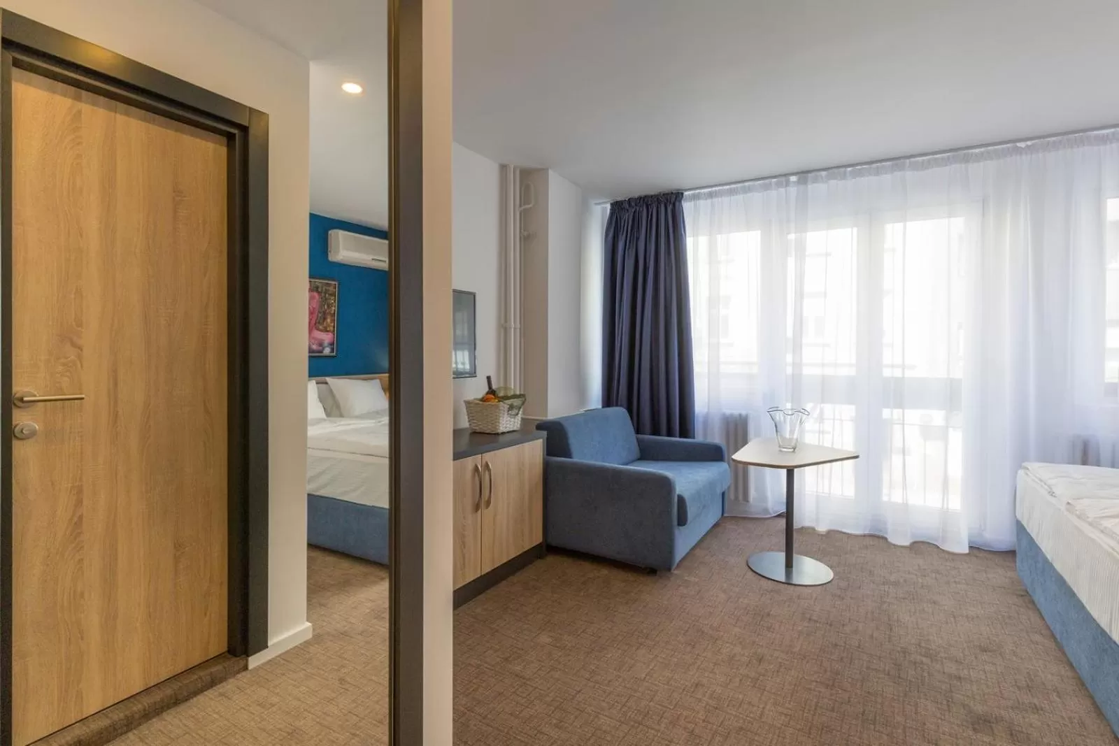 Living room, Bed in Premium Crown Suites