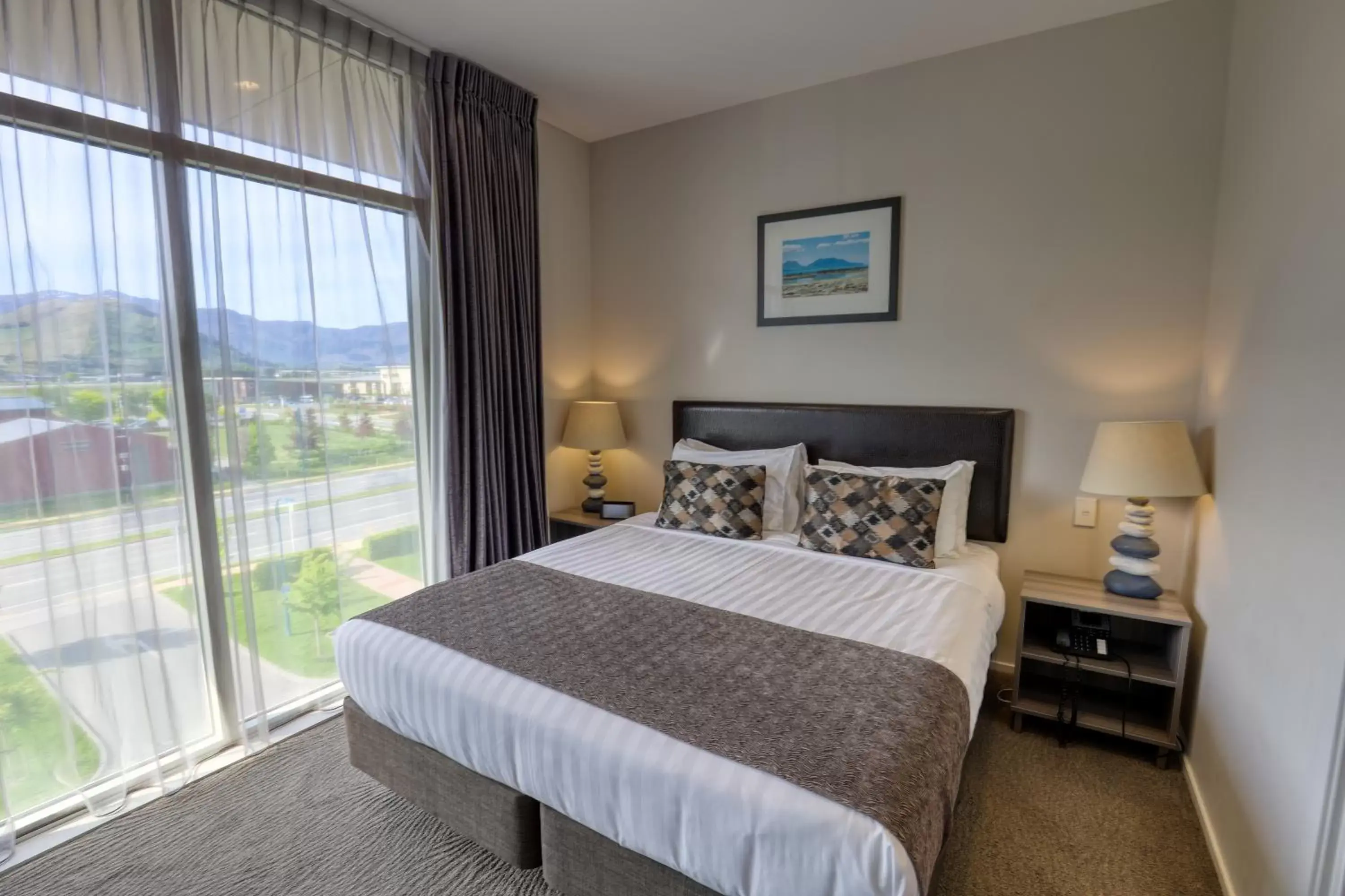 Bedroom, Bed in Ramada Suites by Wyndham Queenstown Remarkables Park