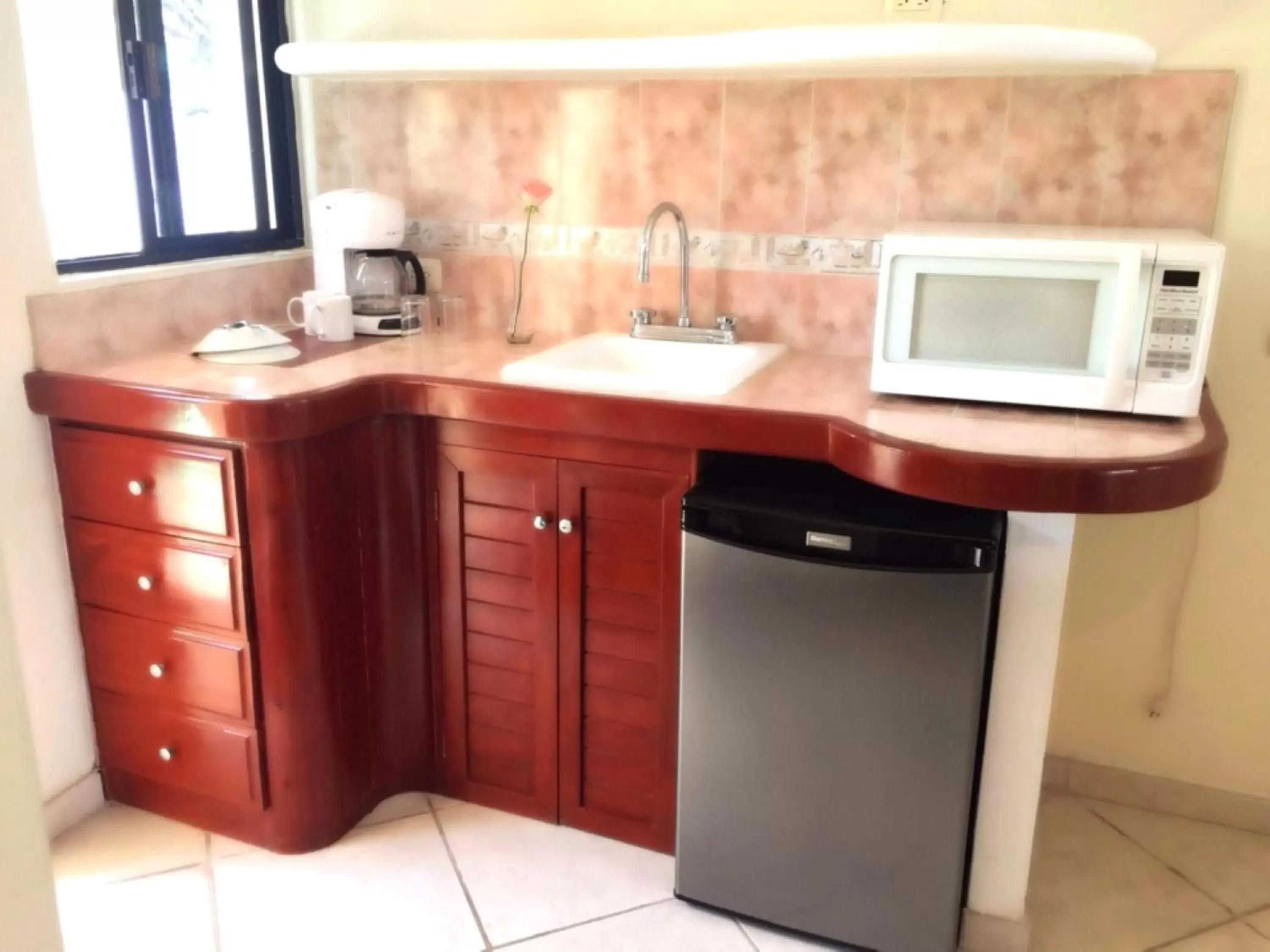 Kitchen or kitchenette, Bathroom in Villas Coco Resort - All Suites