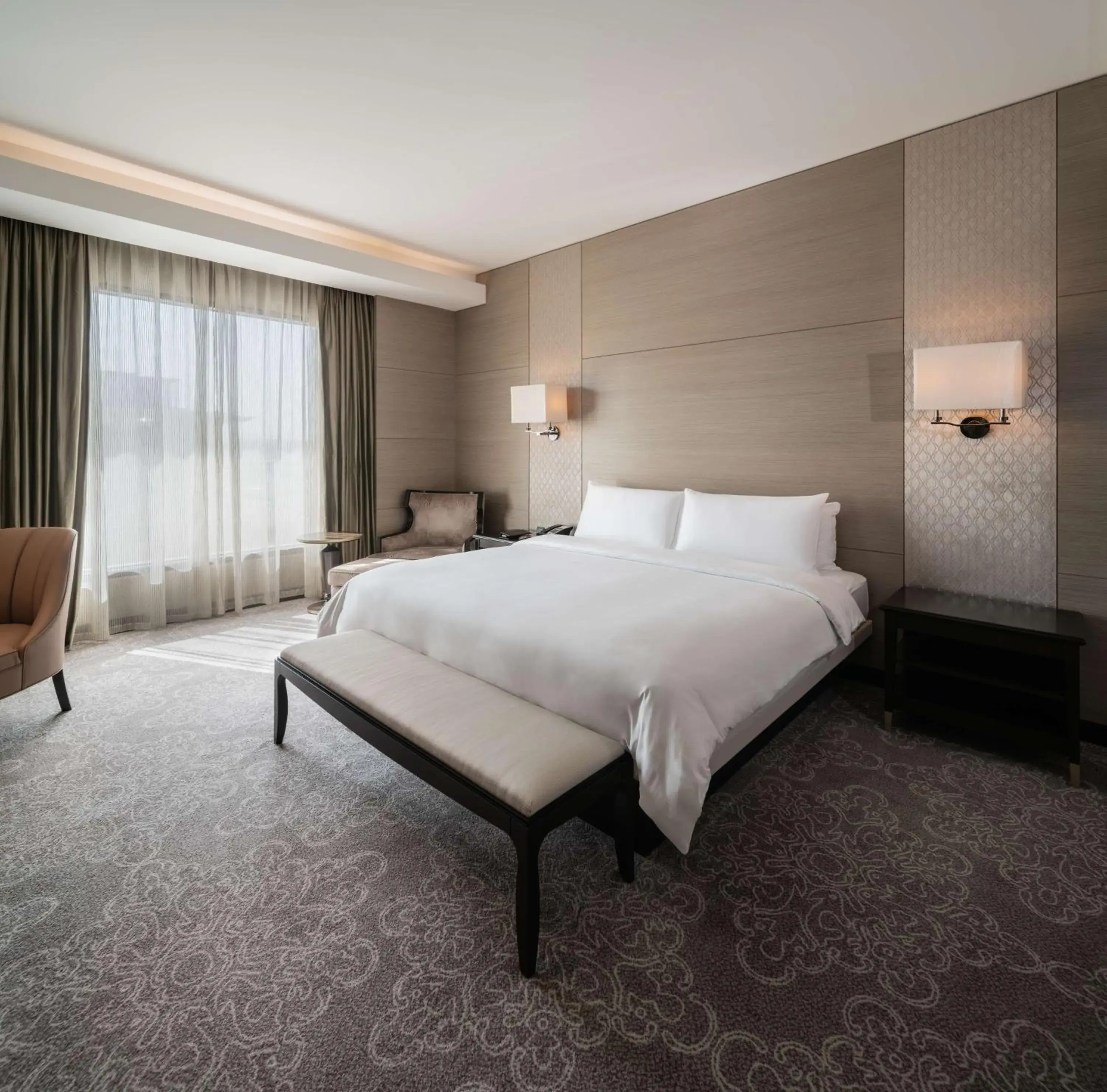 Photo of the whole room, Bed in Radisson Collection Muscat, Hormuz Grand