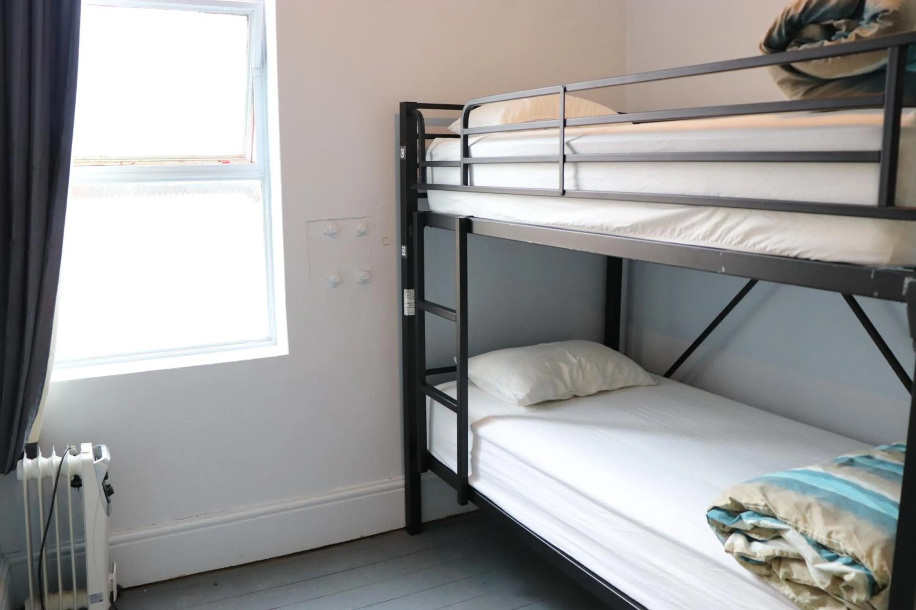 Bed in Backpackers Imperial Hotel