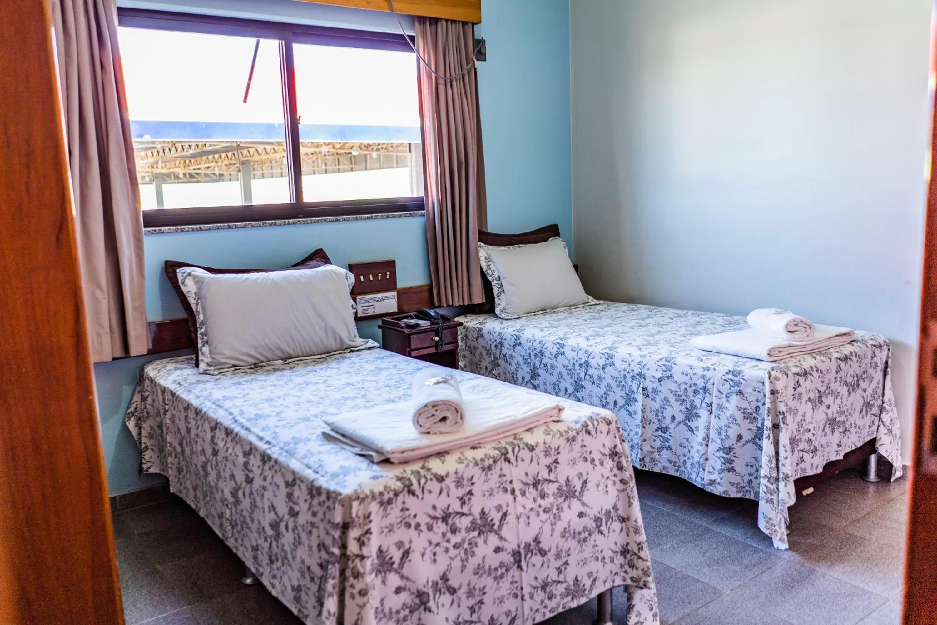 Bed in Pousada Paraiso