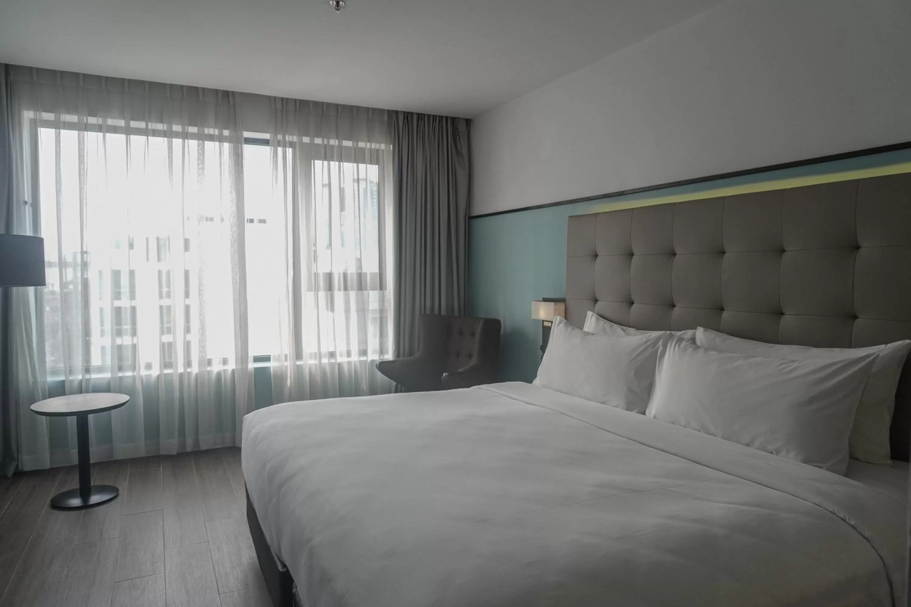 Photo of the whole room, Bed in M Village Hotel Tôn Thất Đạm