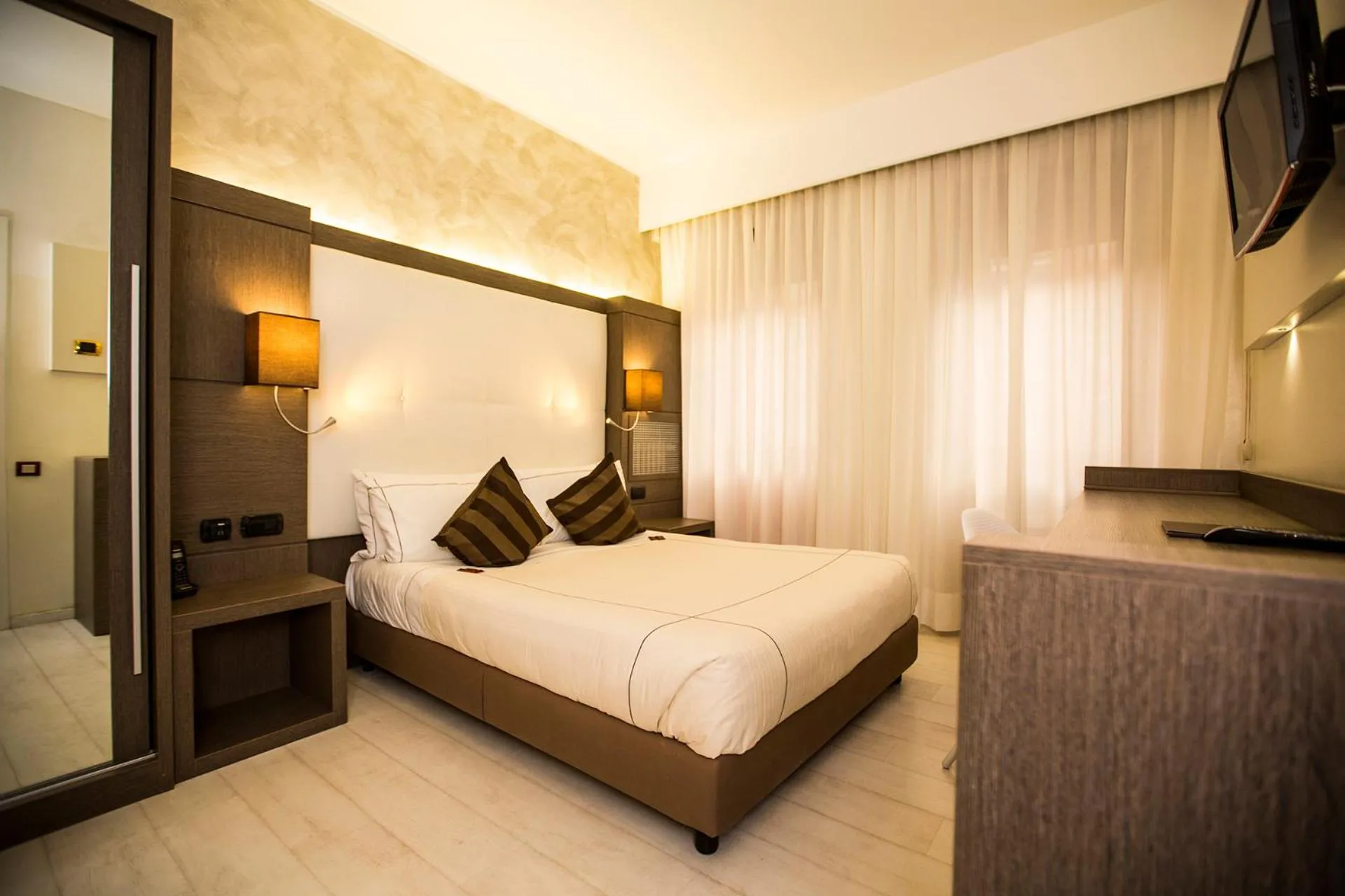 Photo of the whole room, Bed in Agape Hotel AA Hotels